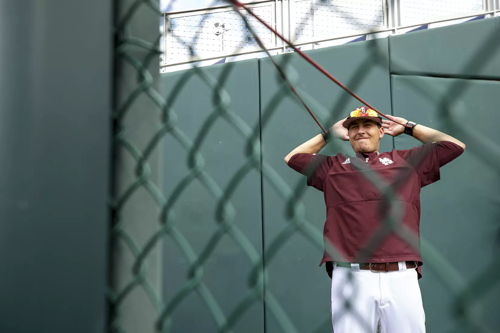 OMAHA, NE - June 22, 2021 - Mississippi State Pitcher Cameron Tullar (#45) stretches in the bullpen before the 2021 Mens College World Series game between the Mississippi State Bulldogs and the Virginia Cavaliers at TD Ameritrade Park in Omaha, NE. Photo By Austin Perryman