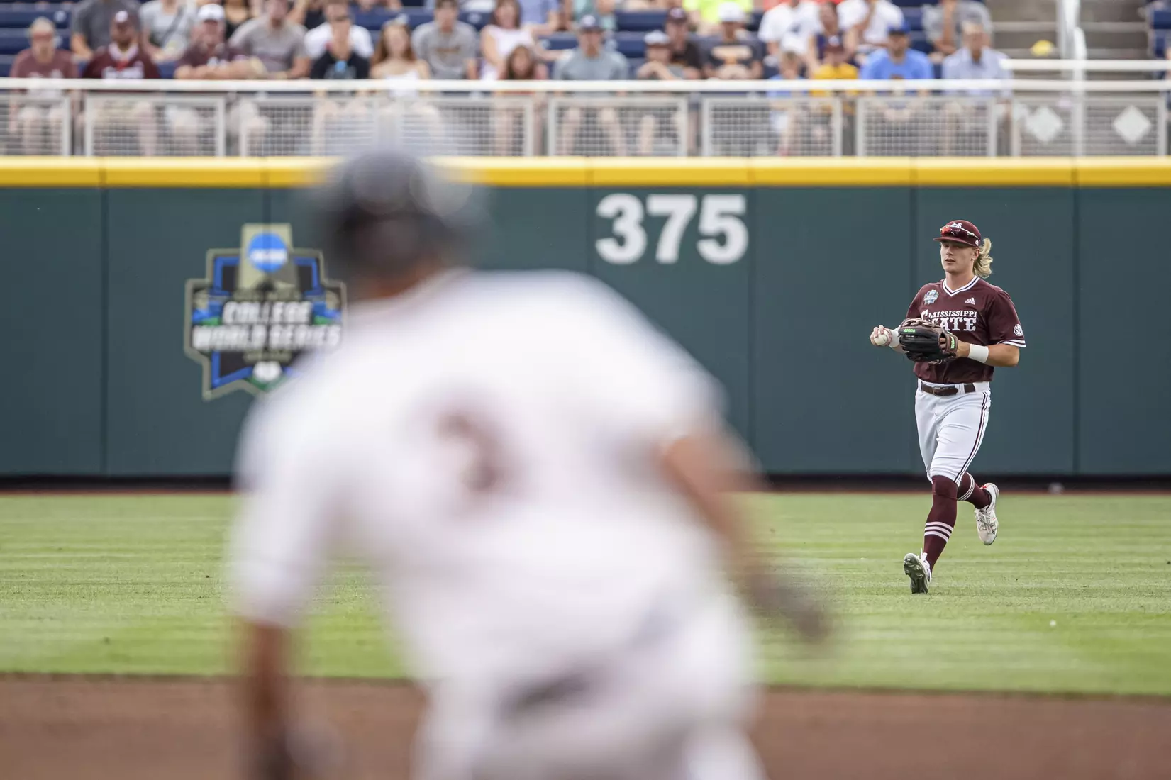 OMAHA, NE - June 22, 2021 - Mississippi State Outfielder Rowdey Jordan (#4) during the 2021 Mens College World Series game between the Mississippi State Bulldogs and the Virginia Cavaliers at TD Ameritrade Park in Omaha, NE. Photo By Austin Perryman