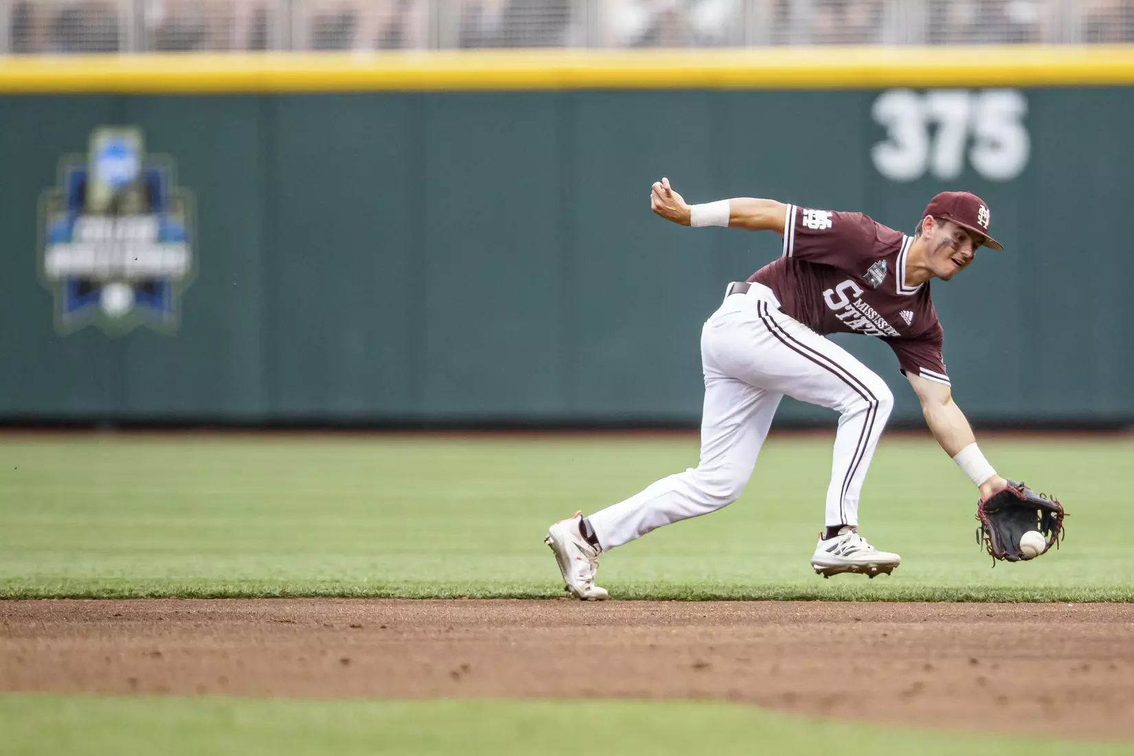 OMAHA, NE - June 22, 2021 - Mississippi State Infielder Scotty Dubrule (#3) during the 2021 Mens College World Series game between the Mississippi State Bulldogs and the Virginia Cavaliers at TD Ameritrade Park in Omaha, NE. Photo By Austin Perryman