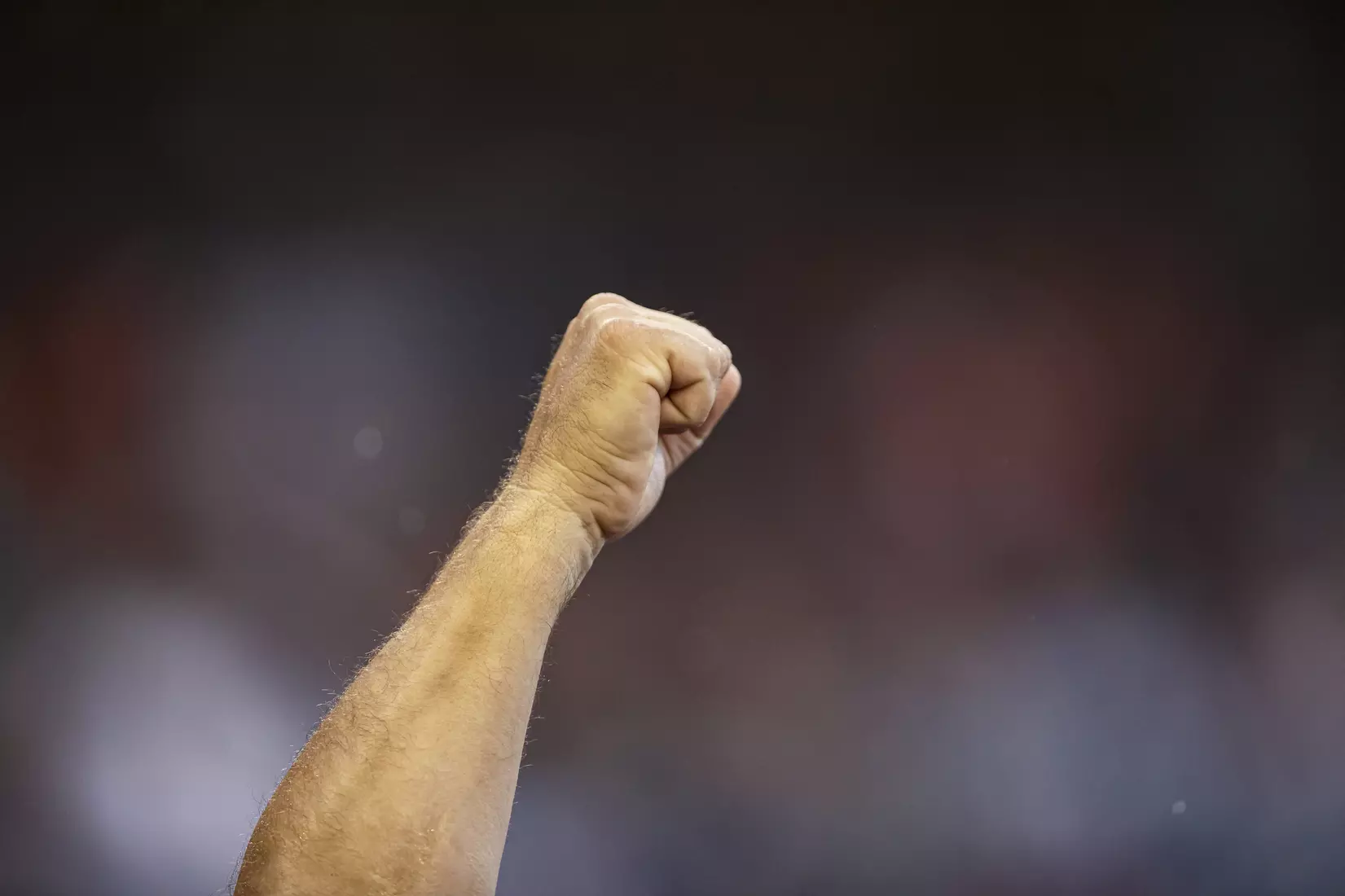 OMAHA, NE - June 22, 2021 - Mississippi State Head Coach Chris Lemonis holds up a fist in celebration during the 2021 Mens College World Series game between the Mississippi State Bulldogs and the Virginia Cavaliers at TD Ameritrade Park in Omaha, NE. Photo By Austin Perryman