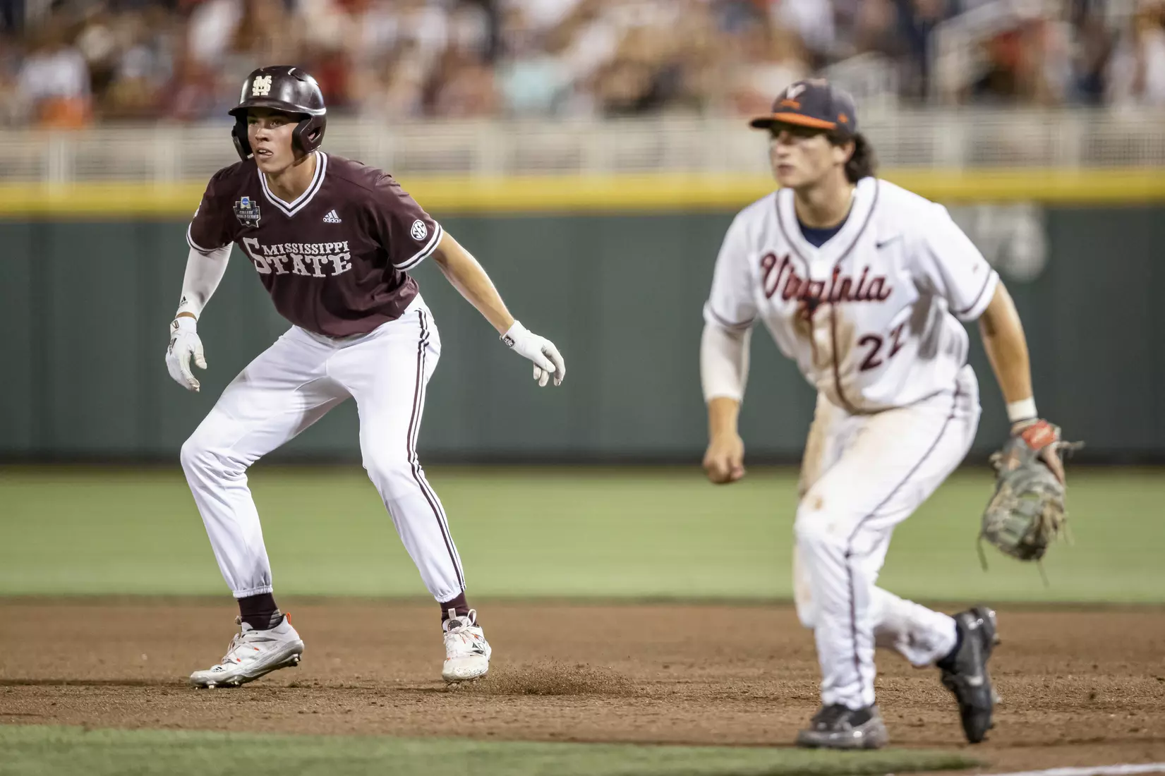 OMAHA, NE - June 22, 2021 - Mississippi State Outfielder Kellum Clark (#11) during the 2021 Mens College World Series game between the Mississippi State Bulldogs and the Virginia Cavaliers at TD Ameritrade Park in Omaha, NE. Photo By Austin Perryman