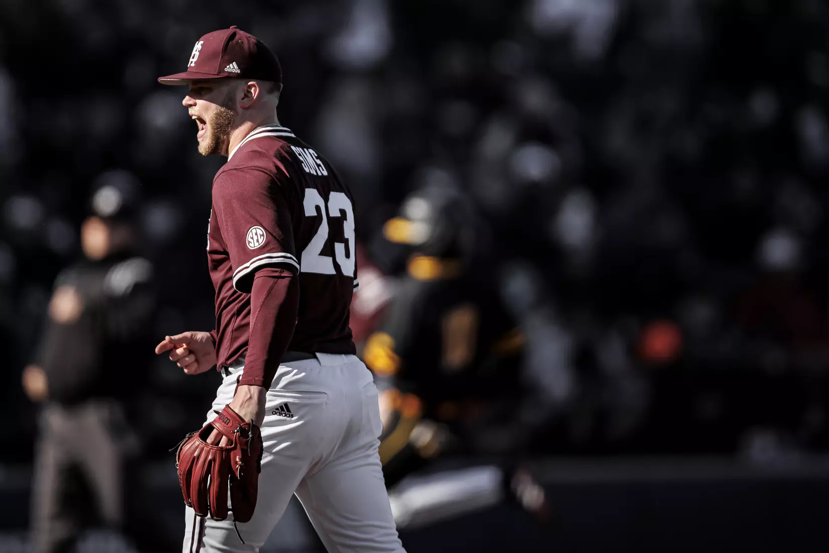 STARKVILLE, MS - February 18, 2022 - Mississippi State Pitcher Landon Sims (#23) celebrates during the game between the Long Beach State Dirtbags and the Mississippi State Bulldogs at Dudy Noble Field at Polk-Dement Stadium in Starkville, MS. Photo By Austin Perryman
