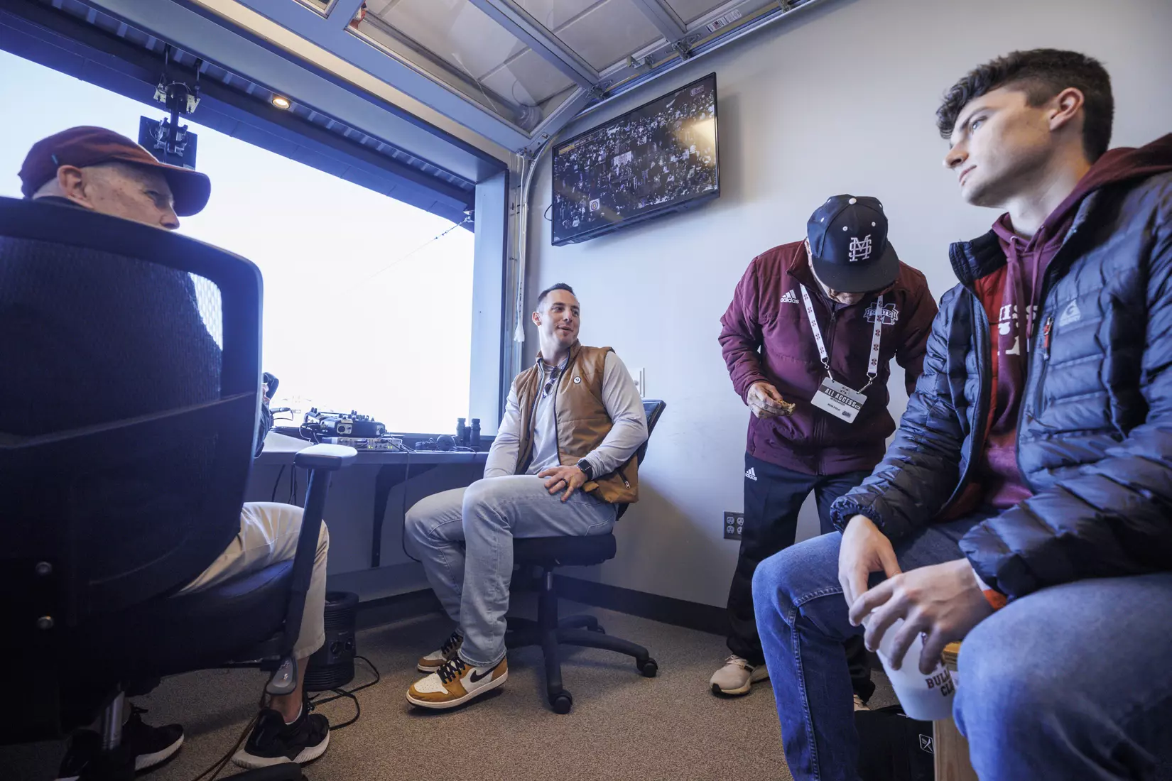 STARKVILLE, MS - February 18, 2022 - Former Mississippi State Outfielder Brent Rooker and Former Infielder Justin Foscue and Mississippi State Special Assistant to the Athletic Director Ron Polk in the radio booth with Radio Broadcast Announcer Jim Ellis during the game between the Long Beach State Dirtbags and the Mississippi State Bulldogs at Dudy Noble Field at Polk-Dement Stadium in Starkville, MS. Photo By Kevin Snyder