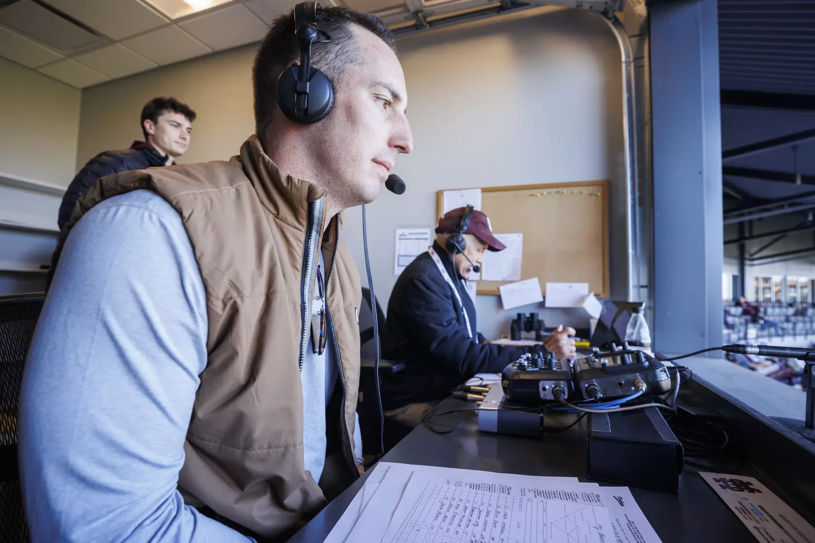 STARKVILLE, MS - February 18, 2022 - Former Mississippi State Outfielder Brent Rooker in the radio booth with Mississippi State Radio Broadcast Announcer Jim Ellis during the game between the Long Beach State Dirtbags and the Mississippi State Bulldogs at Dudy Noble Field at Polk-Dement Stadium in Starkville, MS. Photo By Kevin Snyder