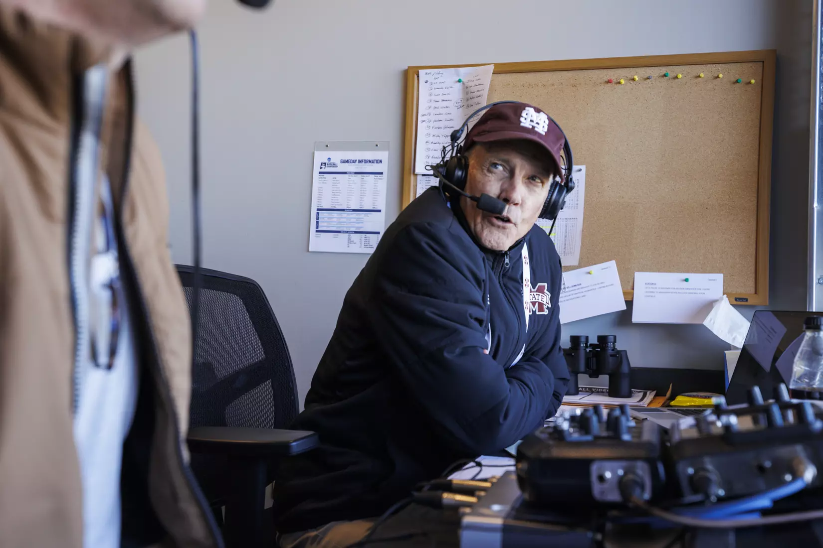 STARKVILLE, MS - February 18, 2022 - Mississippi State Radio Broadcast Announcer Jim Ellis in the radio booth during the game between the Long Beach State Dirtbags and the Mississippi State Bulldogs at Dudy Noble Field at Polk-Dement Stadium in Starkville, MS. Photo By Austin Perryman
