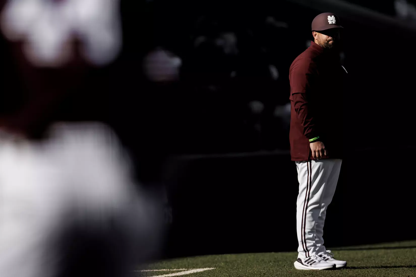 STARKVILLE, MS - February 18, 2022 - Mississippi State Baseball Camps Coordinator/Volunteer Assistant Kyle Cheesebrough during the game between the Long Beach State Dirtbags and the Mississippi State Bulldogs at Dudy Noble Field at Polk-Dement Stadium in Starkville, MS. Photo By Austin Perryman