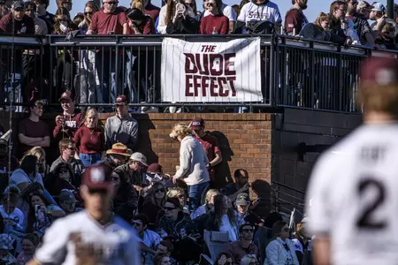 STARKVILLE, MS - February 19, 2022 - Mississippi State fans and The Dude Effect flag during the game between the Long Beach State Dirtbags and the Mississippi State Bulldogs at Dudy Noble Field at Polk-Dement Stadium in Starkville, MS. Photo By Kevin Snyder