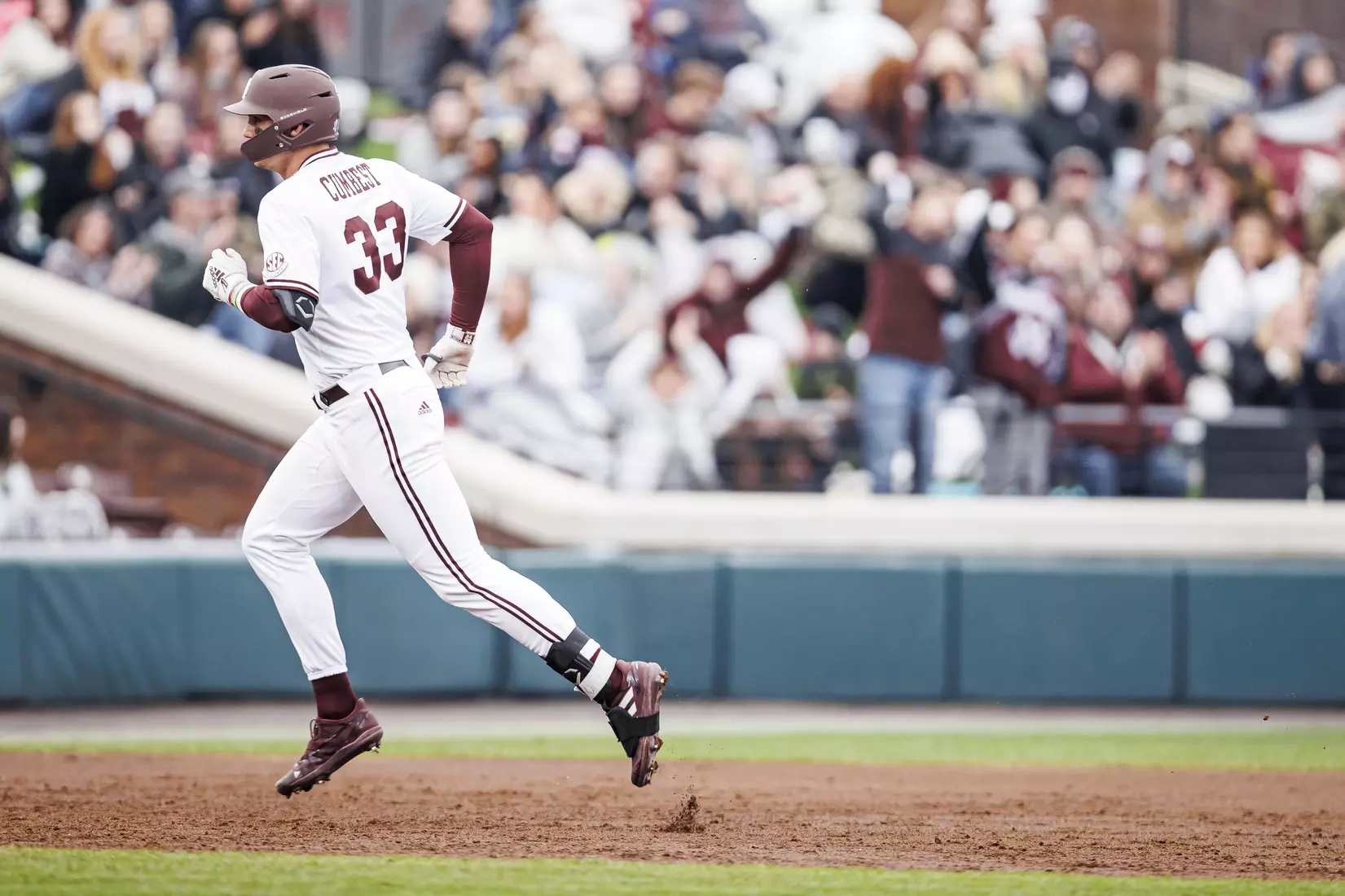 STARKVILLE, MS - February 26, 2022 - Mississippi State Outfielder Brad Cumbest (#33) hits a home run during the game between the Northern Kentucky Norse and the Mississippi State Bulldogs at Dudy Noble Field at Polk-Dement Stadium in Starkville, MS. Photo By Kevin Snyder