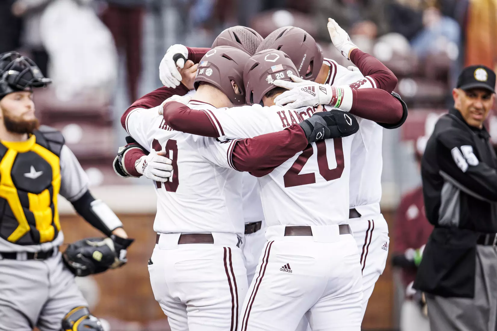 STARKVILLE, MS - February 26, 2022 - Mississippi State Outfielder Brad Cumbest (#33), Mississippi State Infielder Luke Hancock (#20), and Mississippi State Catcher Logan Tanner (#19) celebrate CumbestÕs home run during the game between the Northern Kentucky Norse and the Mississippi State Bulldogs at Dudy Noble Field at Polk-Dement Stadium in Starkville, MS. Photo By Kevin Snyder