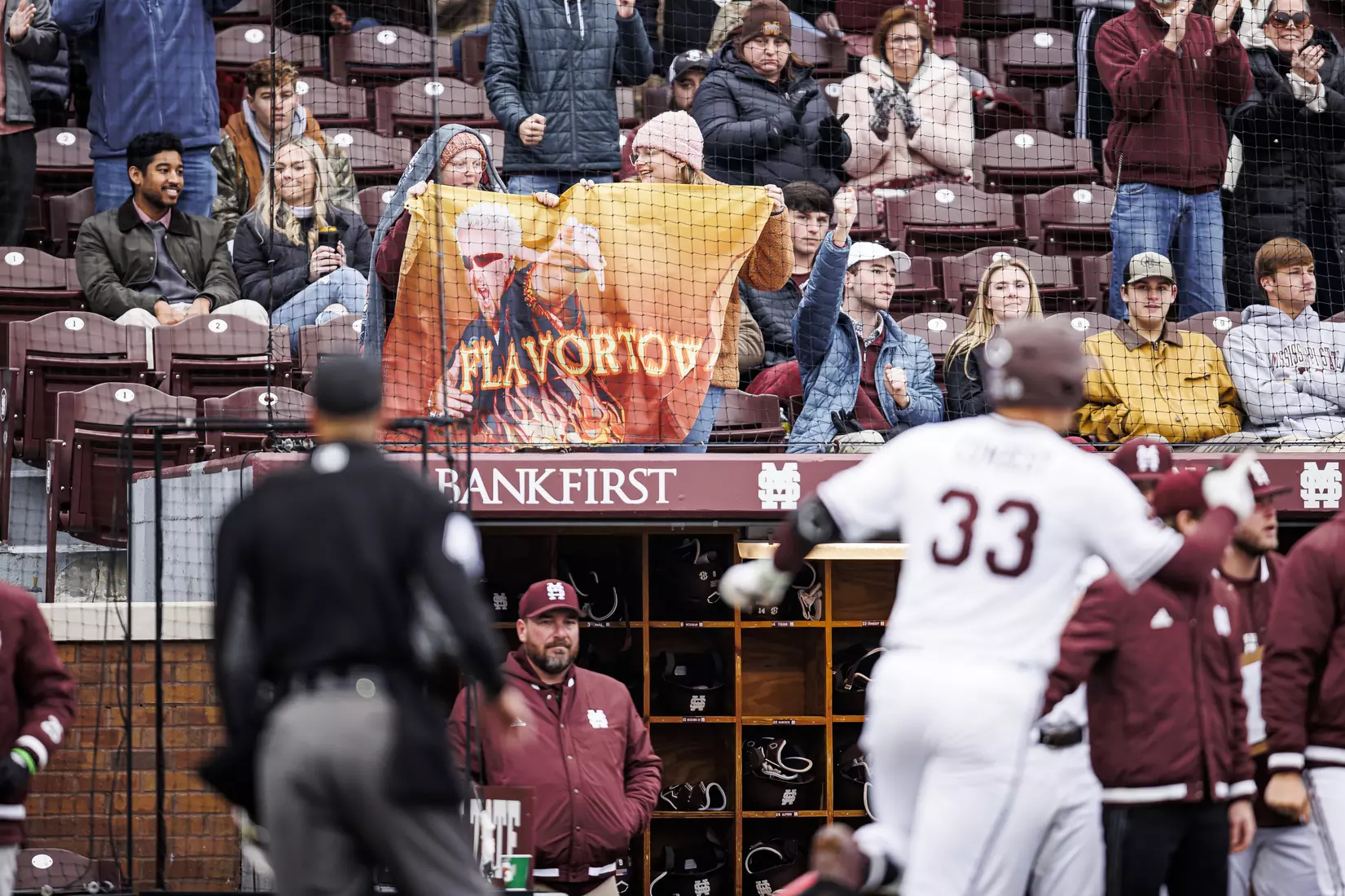 STARKVILLE, MS - February 26, 2022 - Mississippi State fans celebrate a home run hit by Mississippi State Outfielder Brad Cumbest (#33) during the game between the Northern Kentucky Norse and the Mississippi State Bulldogs at Dudy Noble Field at Polk-Dement Stadium in Starkville, MS. Photo By Kevin Snyder