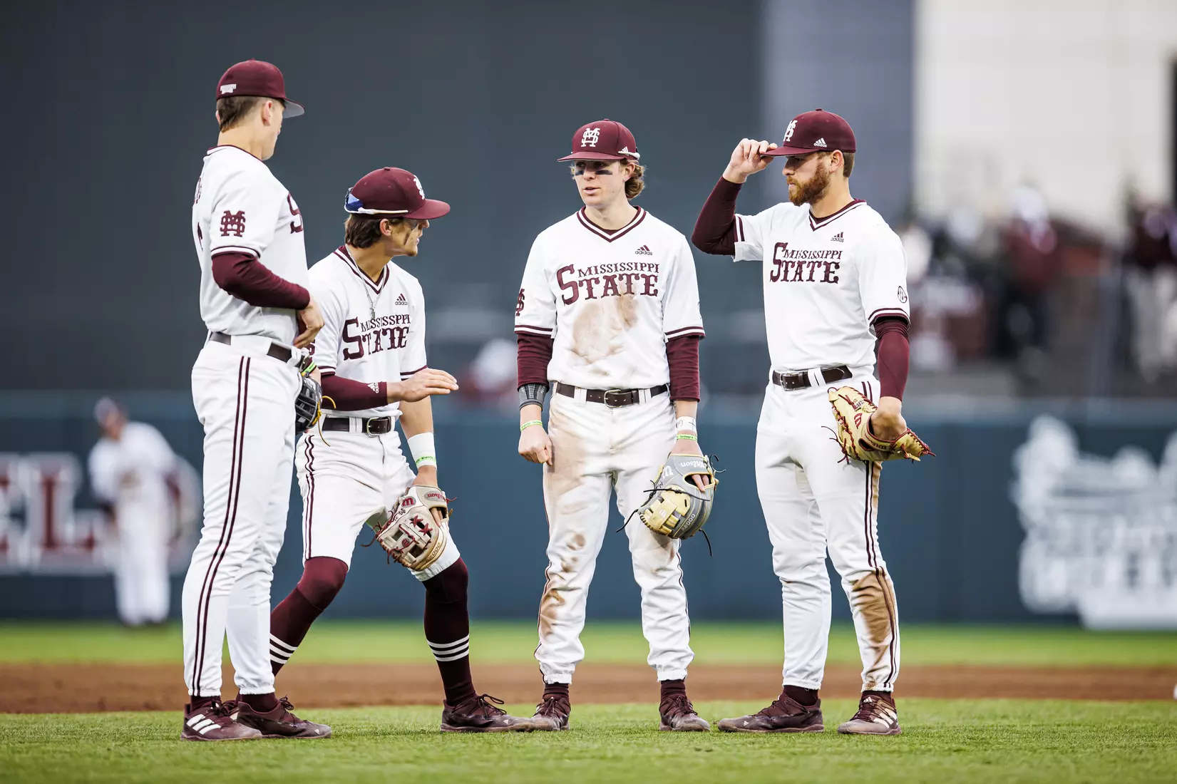 STARKVILLE, MS - February 26, 2022 - Mississippi State Infielder Kamren James (#6), Mississippi State Infielder Tanner Leggett (#31), Mississippi State Infielder Lane Forsythe (#43), and Mississippi State Infielder Luke Hancock (#20) during the game between the Northern Kentucky Norse and the Mississippi State Bulldogs at Dudy Noble Field at Polk-Dement Stadium in Starkville, MS. Photo By Kevin Snyder