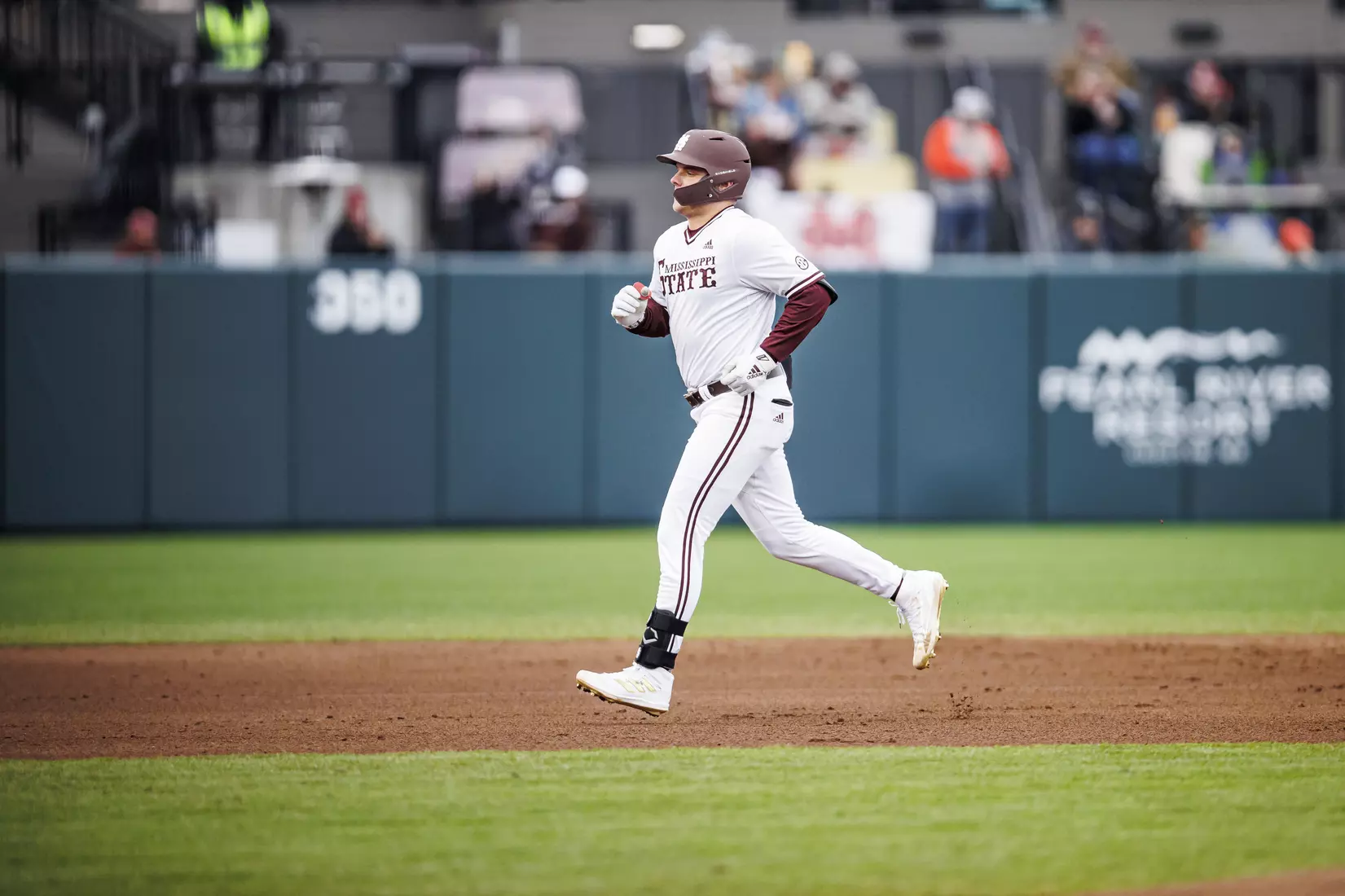 STARKVILLE, MS - February 26, 2022 - Mississippi State Catcher Logan Tanner (#19) circles the bases after a home run during the game between the Northern Kentucky Norse and the Mississippi State Bulldogs at Dudy Noble Field at Polk-Dement Stadium in Starkville, MS. Photo By Kevin Snyder