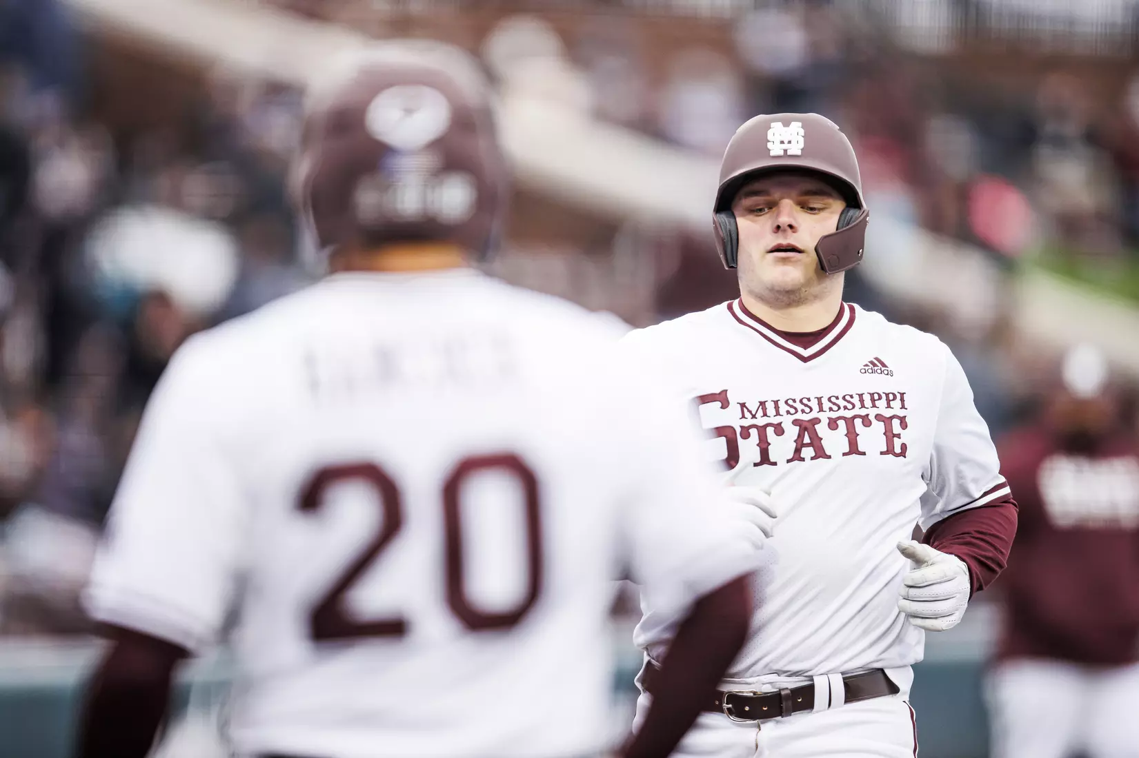 STARKVILLE, MS - February 26, 2022 - Mississippi State Catcher Logan Tanner (#19) crosses home plate after hitting a home run during the game between the Northern Kentucky Norse and the Mississippi State Bulldogs at Dudy Noble Field at Polk-Dement Stadium in Starkville, MS. Photo By Kevin Snyder