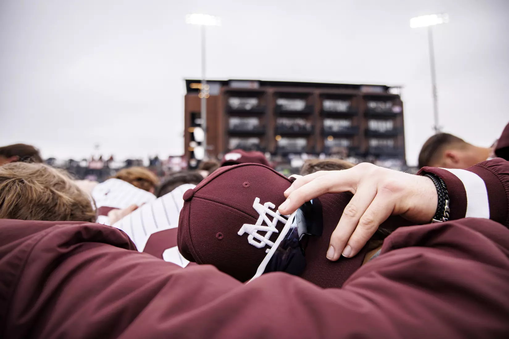 STARKVILLE, MS - February 27, 2022 - The Mississippi State Bulldogs huddle before the game between the Northern Kentucky Norse and the Mississippi State Bulldogs at Dudy Noble Field at Polk-Dement Stadium in Starkville, MS. Photo By Austin Perryman