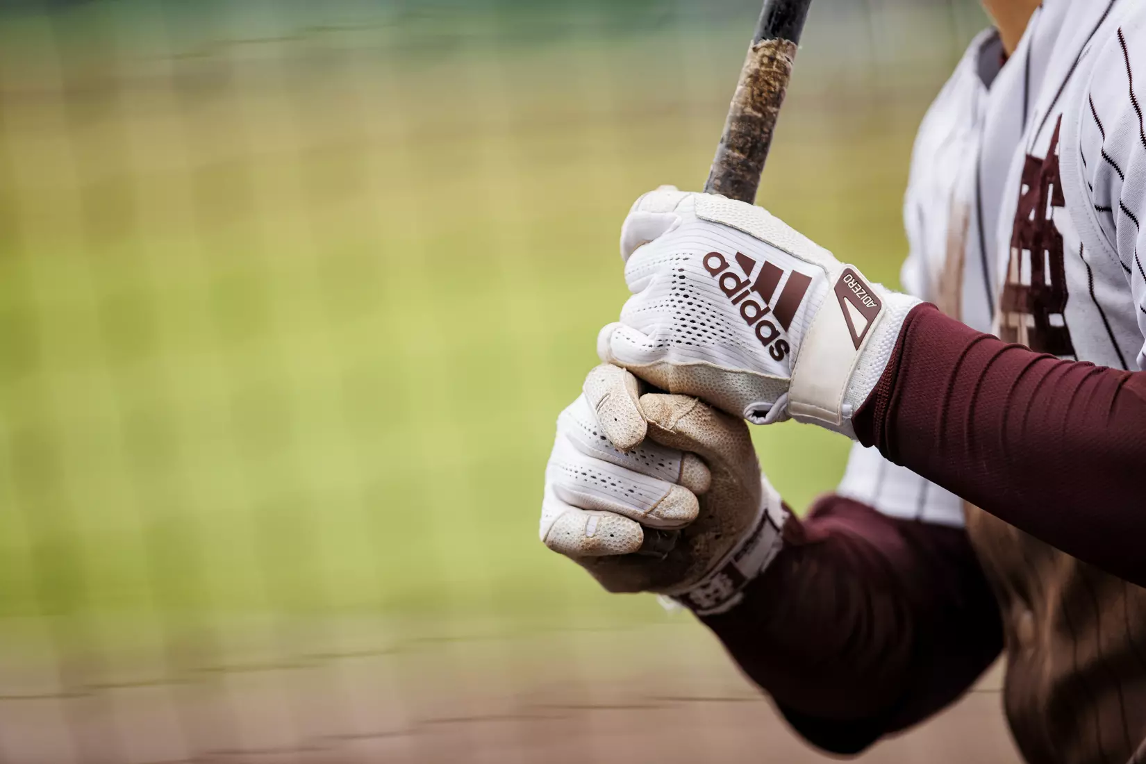 STARKVILLE, MS - February 27, 2022 - Adidas logo batting gloves during the game between the Northern Kentucky Norse and the Mississippi State Bulldogs at Dudy Noble Field at Polk-Dement Stadium in Starkville, MS. Photo By Austin Perryman