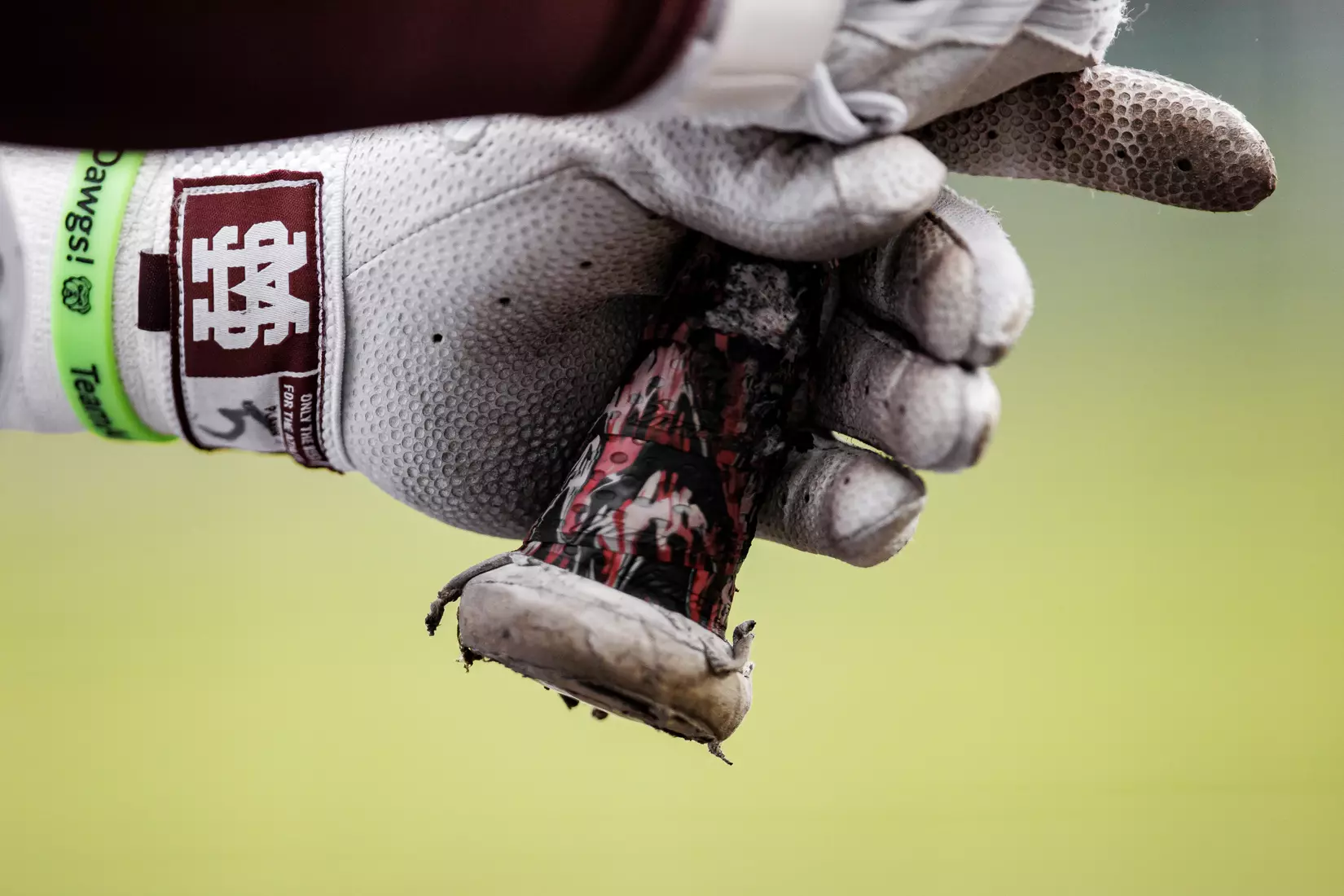 STARKVILLE, MS - February 27, 2022 - M over S logo batting gloves during the game between the Northern Kentucky Norse and the Mississippi State Bulldogs at Dudy Noble Field at Polk-Dement Stadium in Starkville, MS. Photo By Austin Perryman