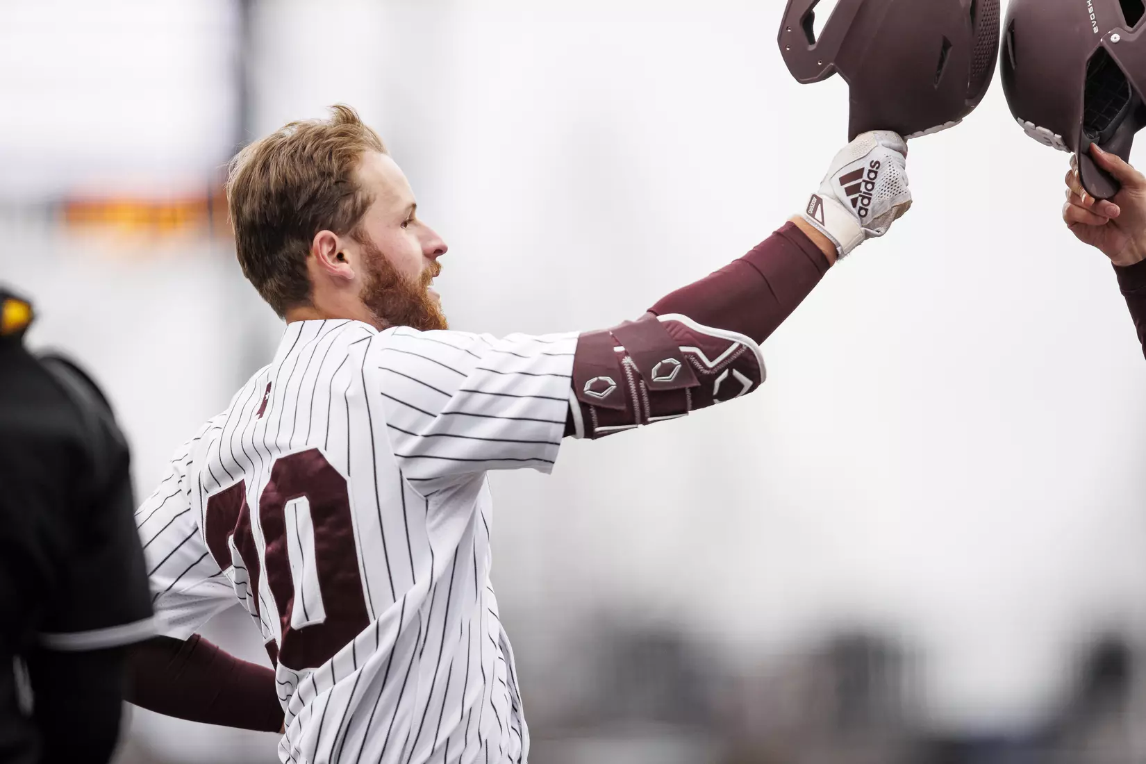 STARKVILLE, MS - February 27, 2022 - Mississippi State Infielder Luke Hancock (#20) celebratesduring the game between the Northern Kentucky Norse and the Mississippi State Bulldogs at Dudy Noble Field at Polk-Dement Stadium in Starkville, MS. Photo By Austin Perryman