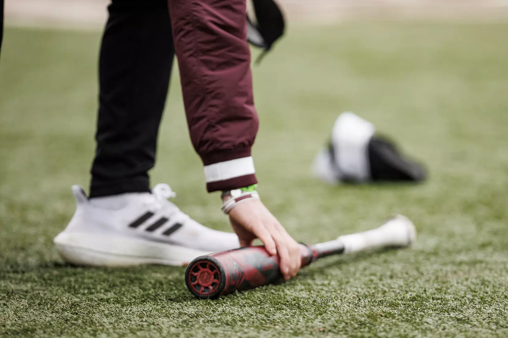 STARKVILLE, MS - February 27, 2022 - A bat is on the ground during the game between the Northern Kentucky Norse and the Mississippi State Bulldogs at Dudy Noble Field at Polk-Dement Stadium in Starkville, MS. Photo By Austin Perryman