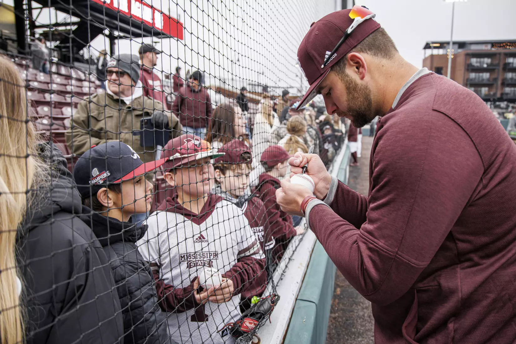 STARKVILLE, MS - February 27, 2022 - Mississippi State Pitcher Preston Johnson (#35) signs autographs after the game between the Northern Kentucky Norse and the Mississippi State Bulldogs at Dudy Noble Field at Polk-Dement Stadium in Starkville, MS. Photo By Austin Perryman