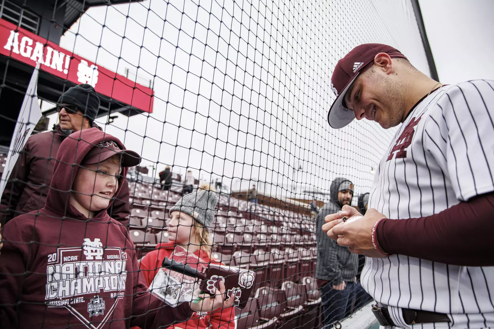 STARKVILLE, MS - February 27, 2022 - Mississippi State Catcher Logan Tanner (#19) signs autographs for fans after the game between the Northern Kentucky Norse and the Mississippi State Bulldogs at Dudy Noble Field at Polk-Dement Stadium in Starkville, MS. Photo By Austin Perryman
