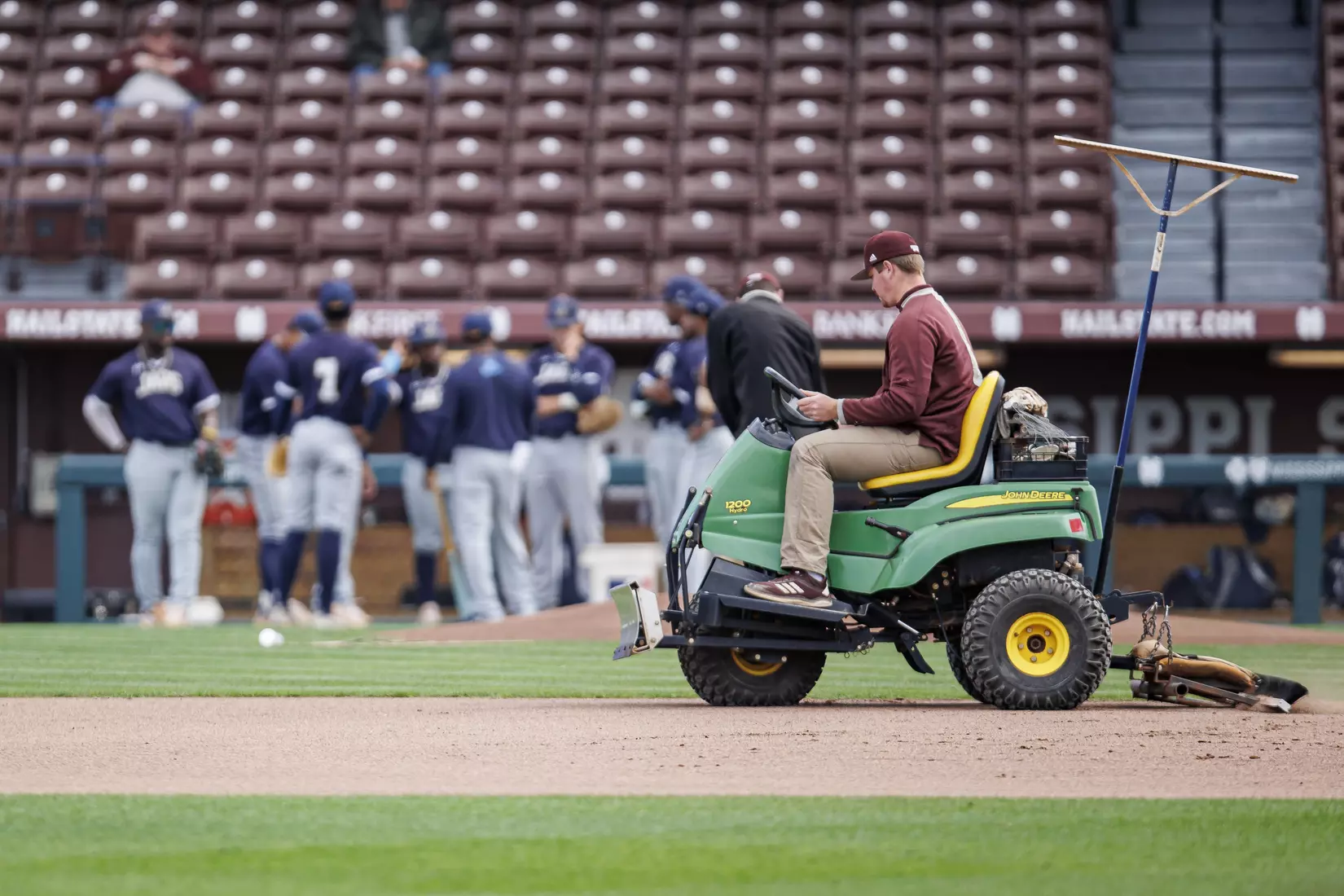 STARKVILLE, MS - March 23, 2022 - The grounds crew drags the infield before the game between the Southern Jaguars and the Mississippi State Bulldogs at Dudy Noble Field at Polk-Dement Stadium in Starkville, MS. Photo By Austin Perryman