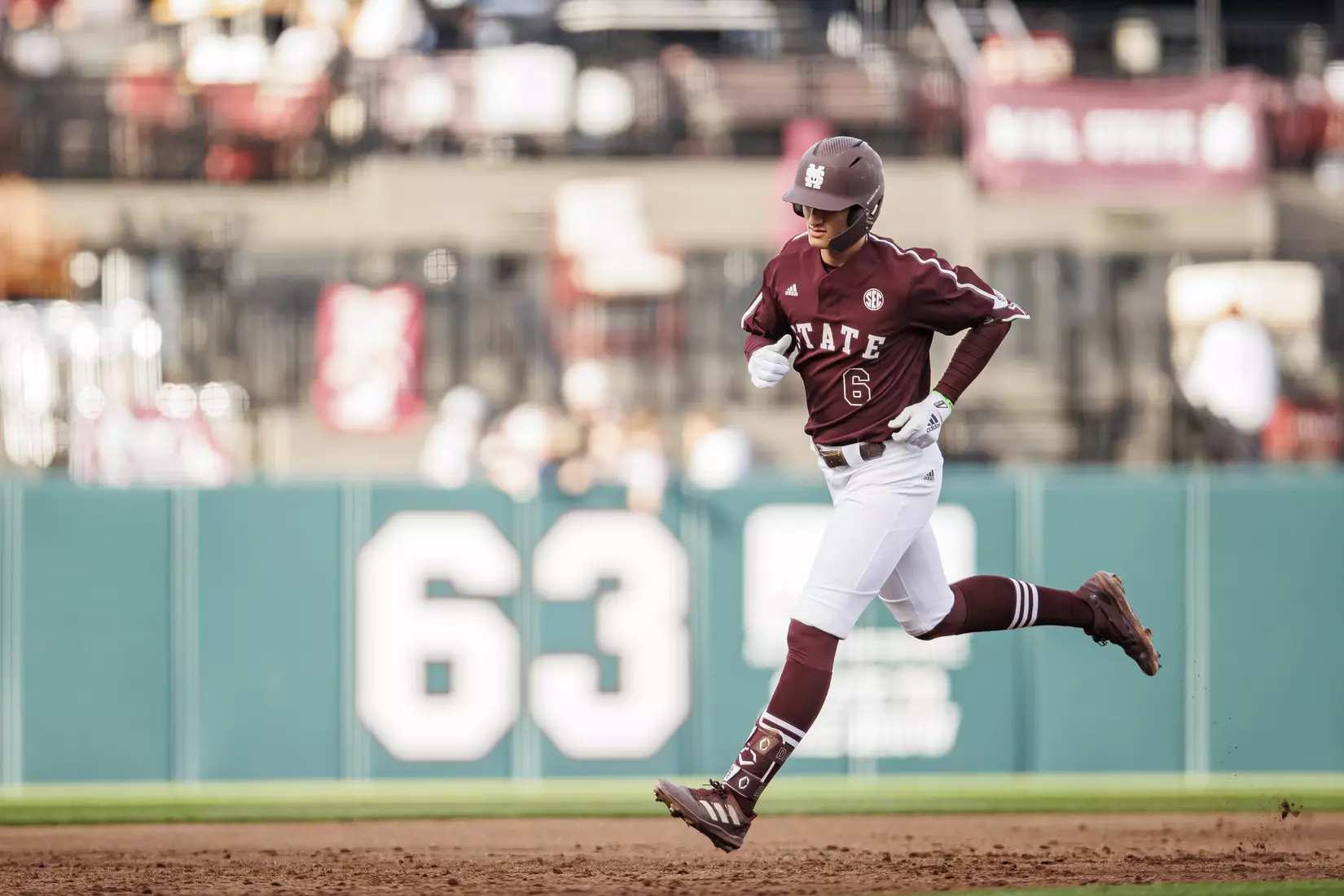 STARKVILLE, MS - March 23, 2022 - Mississippi State Infielder Kamren James (#6) runs the bases after hitting a home run during the game between the Southern Jaguars and the Mississippi State Bulldogs at Dudy Noble Field at Polk-Dement Stadium in Starkville, MS. Photo By Austin Perryman