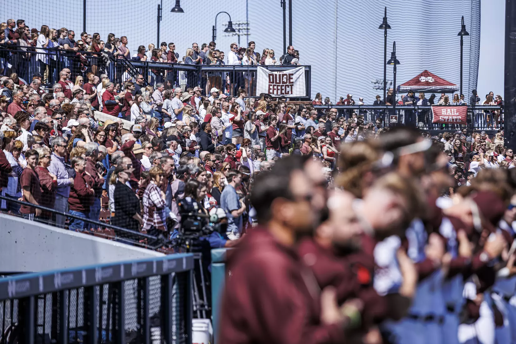 STARKVILLE, MS - March 26, 2022 - Mississippi State fans during the National Anthem before the game between the Alabama Crimson Tide and the Mississippi State Bulldogs at Dudy Noble Field at Polk-Dement Stadium in Starkville, MS. Photo By Kevin Snyder