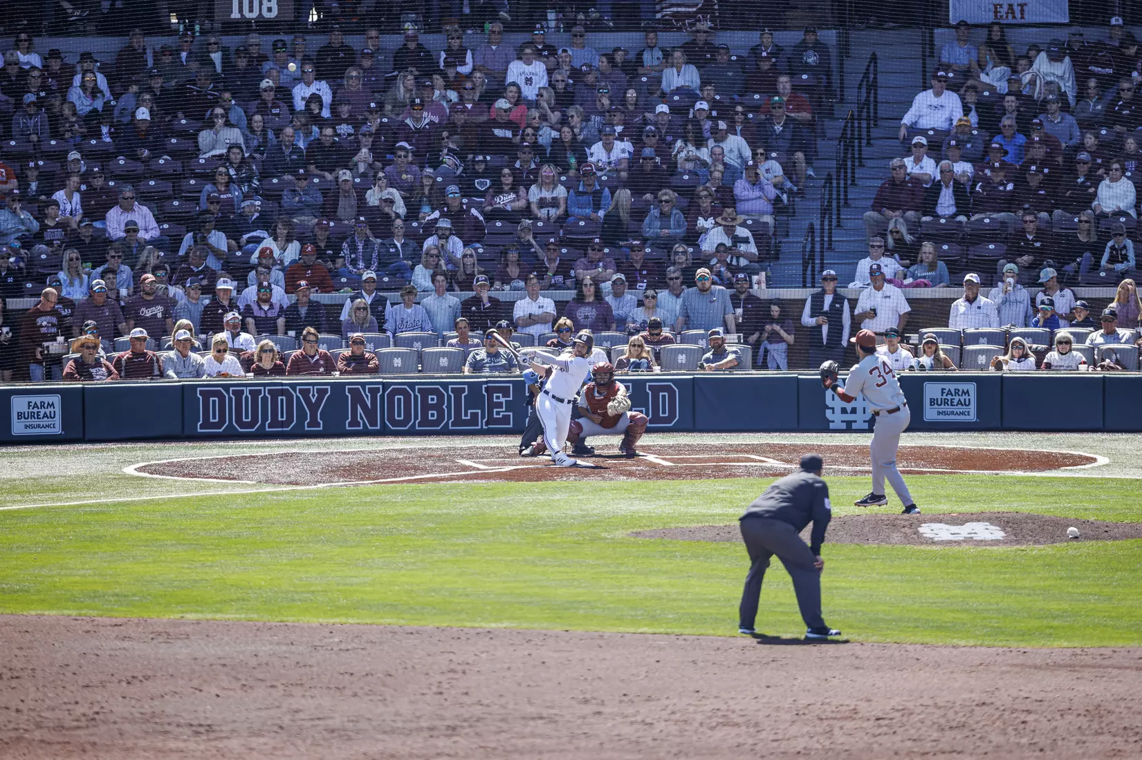 STARKVILLE, MS - March 26, 2022 - Mississippi State Infielder Luke Hancock (#20) hits a home run during the game between the Alabama Crimson Tide and the Mississippi State Bulldogs at Dudy Noble Field at Polk-Dement Stadium in Starkville, MS. Photo By Kevin Snyder