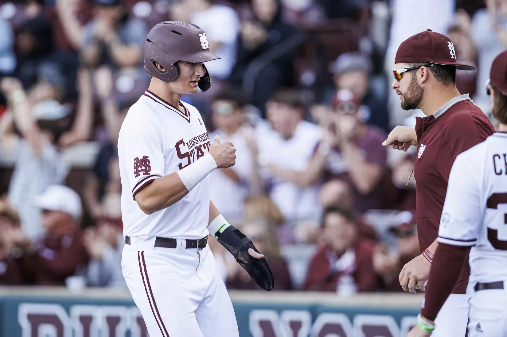 STARKVILLE, MS - March 26, 2022 - Mississippi State Infielder Kamren James (#6) and Mississippi State Pitcher Preston Johnson (#35) during the game between the Alabama Crimson Tide and the Mississippi State Bulldogs at Dudy Noble Field at Polk-Dement Stadium in Starkville, MS. Photo By Kevin Snyder