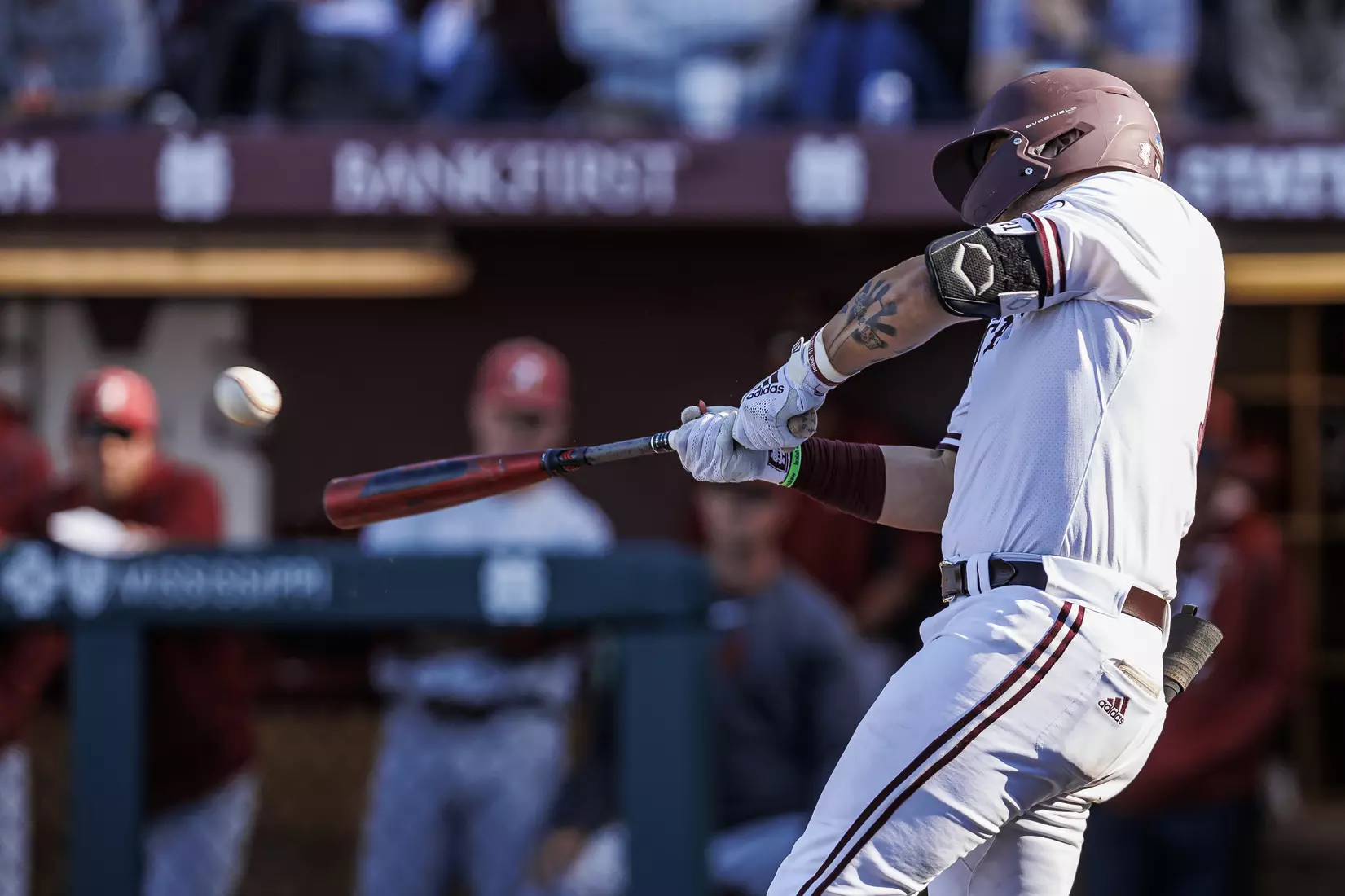 STARKVILLE, MS - March 26, 2022 - Mississippi State Catcher Logan Tanner (#19) hits a game-tying home run during the game between the Alabama Crimson Tide and the Mississippi State Bulldogs at Dudy Noble Field at Polk-Dement Stadium in Starkville, MS. Photo By Kevin Snyder
