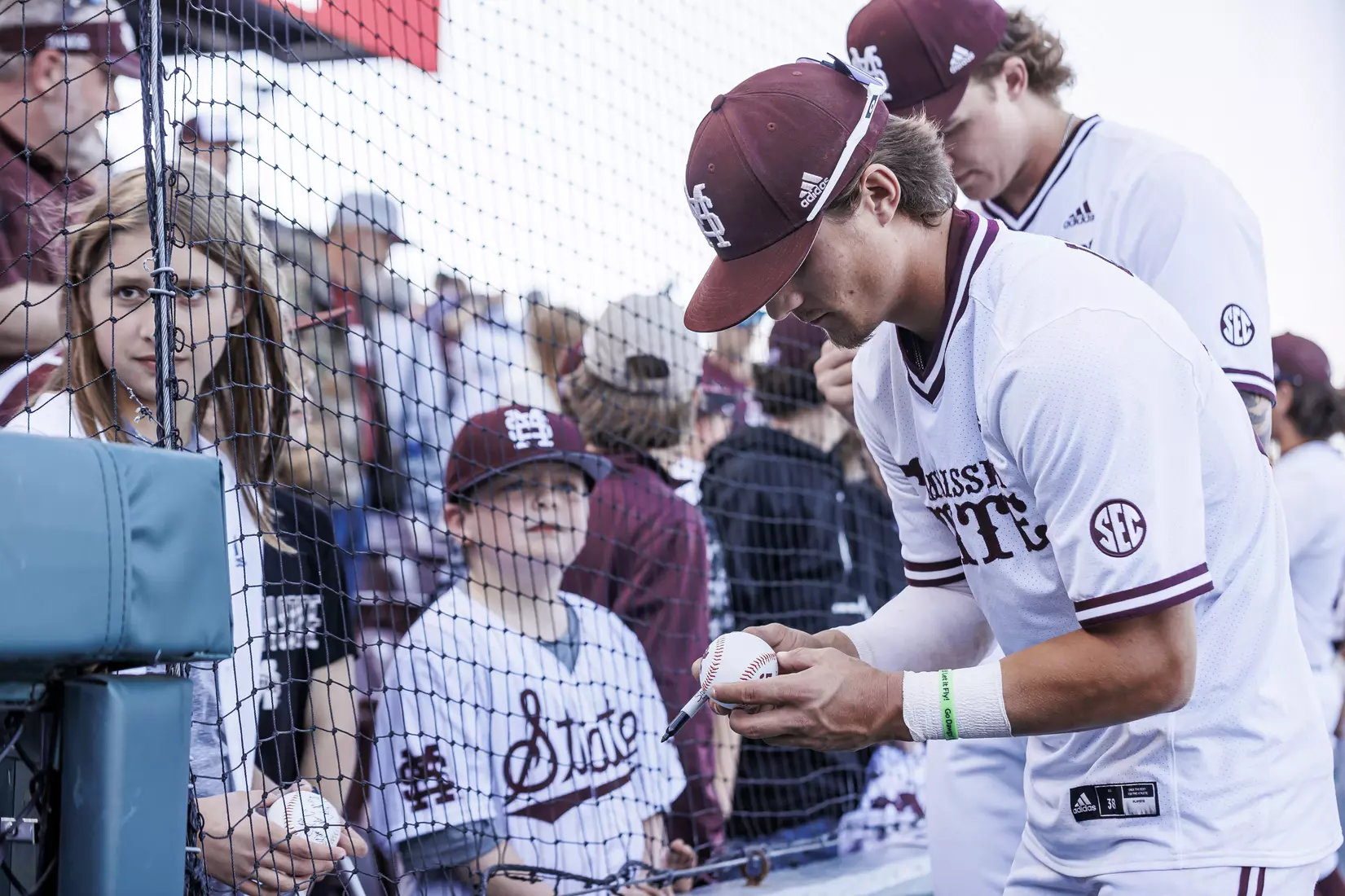 STARKVILLE, MS - March 26, 2022 - Mississippi State Infielder Tanner Leggett (#31) signs autographs after the game between the Alabama Crimson Tide and the Mississippi State Bulldogs at Dudy Noble Field at Polk-Dement Stadium in Starkville, MS. Photo By Kevin Snyder