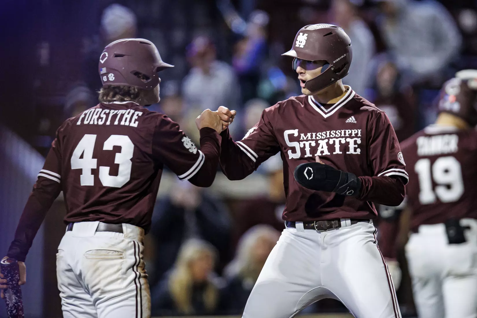 STARKVILLE, MS - April 08, 2022 - Mississippi State Infielder Lane Forsythe (#43) and Infielder Kamren James (#6) celebrate during the game between the LSU Tigers and the Mississippi State Bulldogs at Dudy Noble Field at Polk-Dement Stadium in Starkville, MS. Photo By Austin Perryman