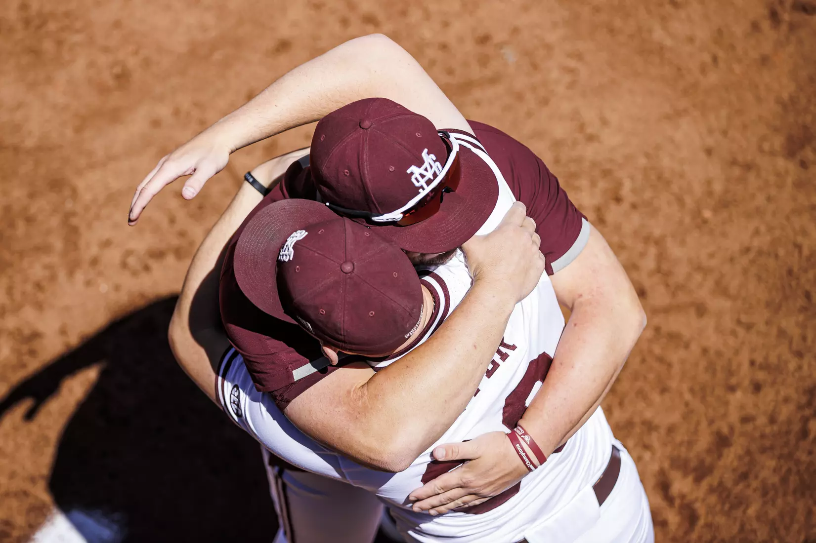 STARKVILLE, MS - April 09, 2022 - Mississippi State Pitcher Preston Johnson (#35) hugs Mississippi State Pitcher Mikey Tepper (#39) before the game between the LSU Tigers and the Mississippi State Bulldogs at Dudy Noble Field at Polk-Dement Stadium in Starkville, MS. Photo By Mississippi State Athletics