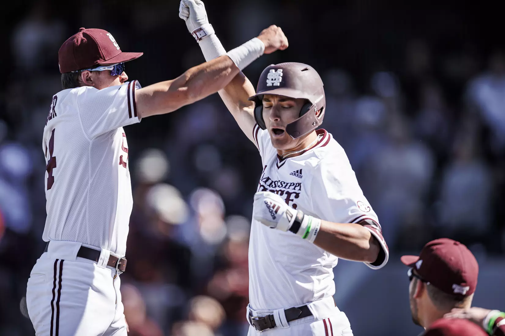 STARKVILLE, MS - April 09, 2022 - Mississippi State Infielder/Outfielder Matt Corder (#14) and Mississippi State Infielder Kamren James (#6) during the game between the LSU Tigers and the Mississippi State Bulldogs at Dudy Noble Field at Polk-Dement Stadium in Starkville, MS. Photo By Mississippi State Athletics