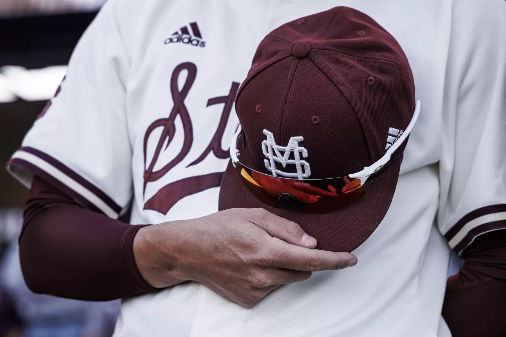STARKVILLE, MS - April 19, 2022 - Mississippi State hat during the National Anthem before the game between the Jackson State Tigers and the Mississippi State Bulldogs at Dudy Noble Field at Polk-Dement Stadium in Starkville, MS. Photo By Kevin Snyder