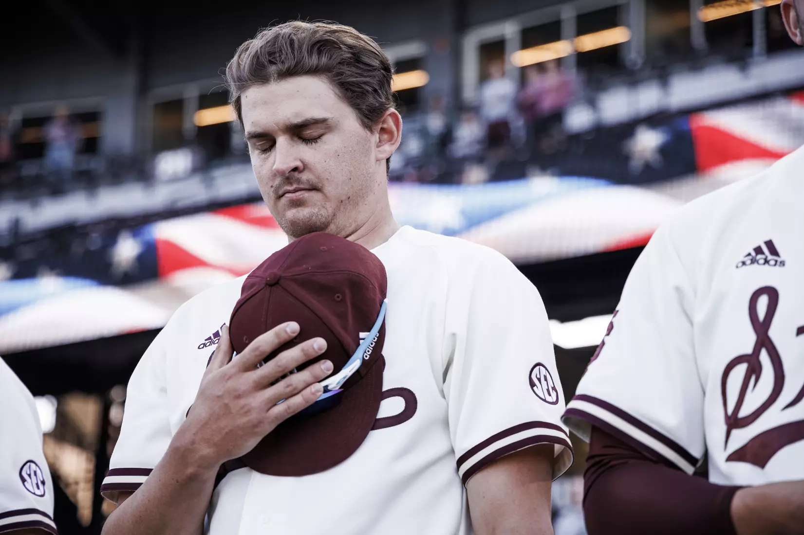 STARKVILLE, MS - April 19, 2022 - Mississippi State Infielder/Outfielder Matt Corder (#14) during the National Anthem before the game between the Jackson State Tigers and the Mississippi State Bulldogs at Dudy Noble Field at Polk-Dement Stadium in Starkville, MS. Photo By Kevin Snyder