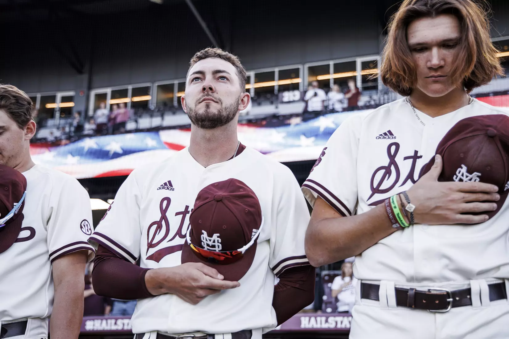 STARKVILLE, MS - April 19, 2022 - Mississippi State Outfielder Drew McGowan (#8) during the National Anthem before the game between the Jackson State Tigers and the Mississippi State Bulldogs at Dudy Noble Field at Polk-Dement Stadium in Starkville, MS. Photo By Kevin Snyder