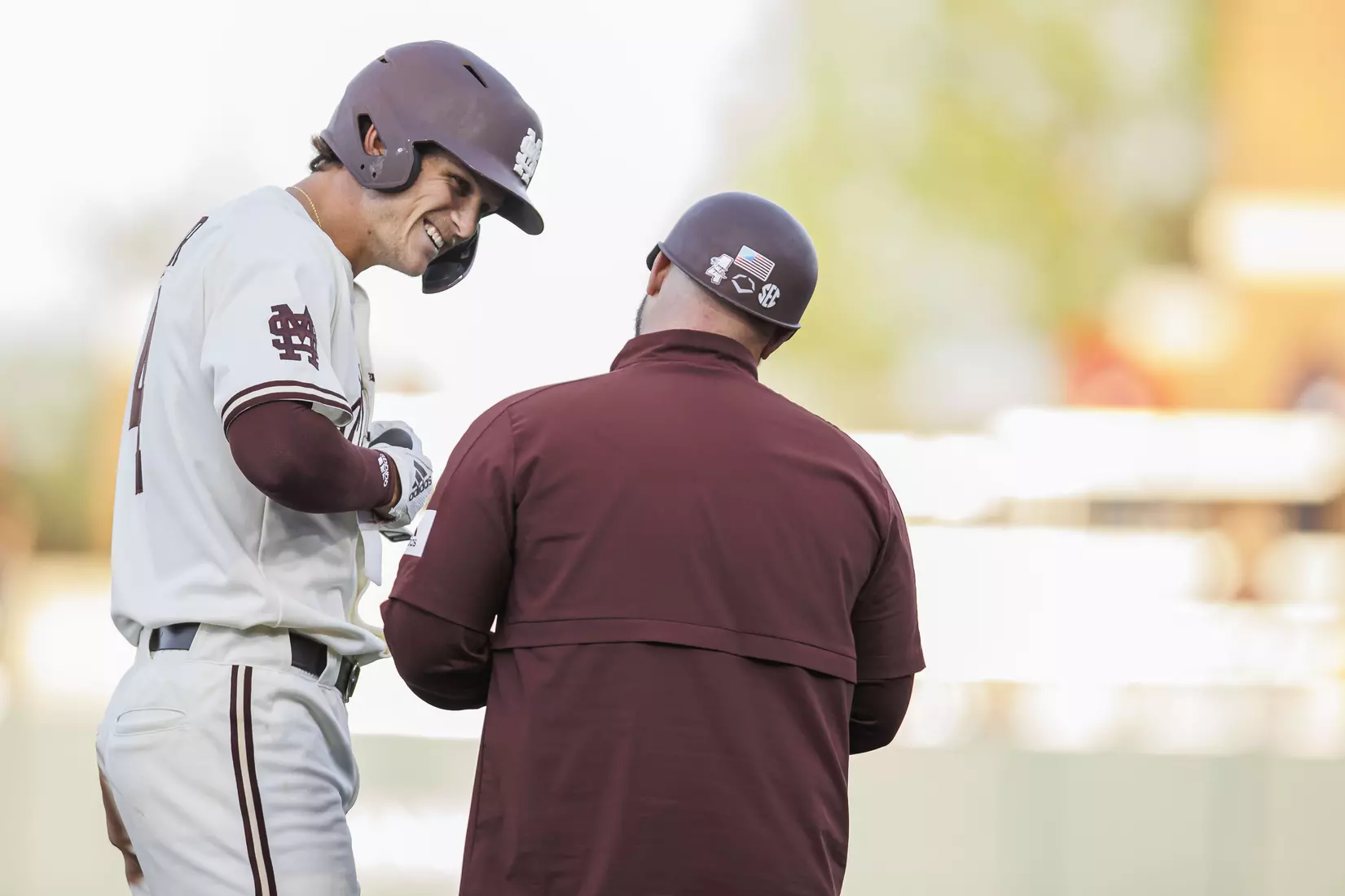STARKVILLE, MS - April 19, 2022 - Mississippi State Infielder RJ Yeager (#4) and Baseball Camps Coordinator/Volunteer Assistant Kyle Cheesebrough during the game between the Jackson State Tigers and the Mississippi State Bulldogs at Dudy Noble Field at Polk-Dement Stadium in Starkville, MS. Photo By Sloane Bush