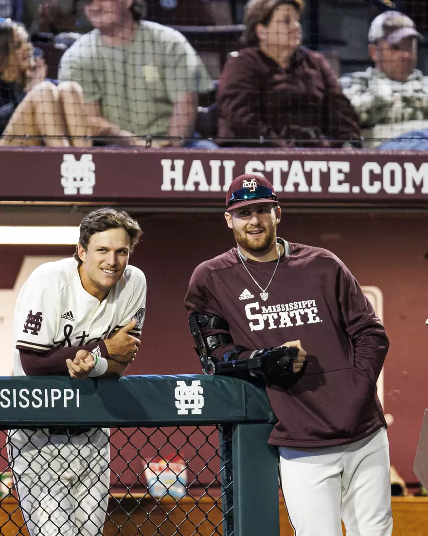 STARKVILLE, MS - April 19, 2022 - Mississippi State Infielder RJ Yeager (#4) and Mississippi State Pitcher Stone Simmons (#17) during the game between the Jackson State Tigers and the Mississippi State Bulldogs at Dudy Noble Field at Polk-Dement Stadium in Starkville, MS. Photo By Sloane Bush