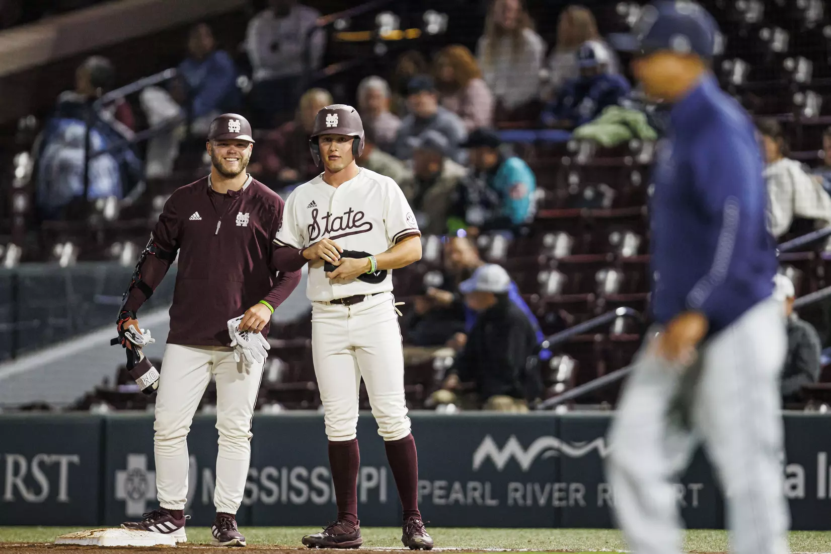 STARKVILLE, MS - April 19, 2022 - Mississippi State Pitcher Landon Sims (#23) and Outfielder Jess Davis (#3) during the game between the Jackson State Tigers and the Mississippi State Bulldogs at Dudy Noble Field at Polk-Dement Stadium in Starkville, MS. Photo By Sloane Bush