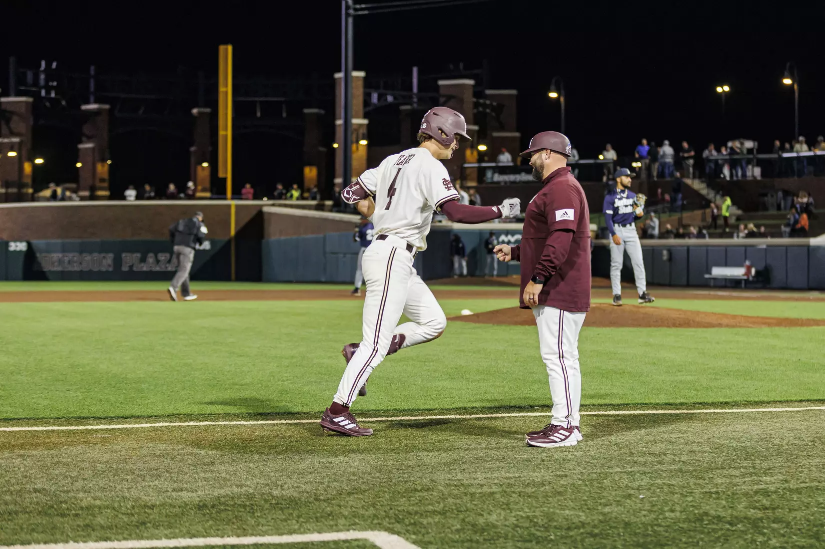STARKVILLE, MS - April 19, 2022 - Mississippi State Infielder RJ Yeager (#4) and Baseball Camps Coordinator/Volunteer Assistant Kyle Cheesebrough during the game between the Jackson State Tigers and the Mississippi State Bulldogs at Dudy Noble Field at Polk-Dement Stadium in Starkville, MS. Photo By Sloane Bush