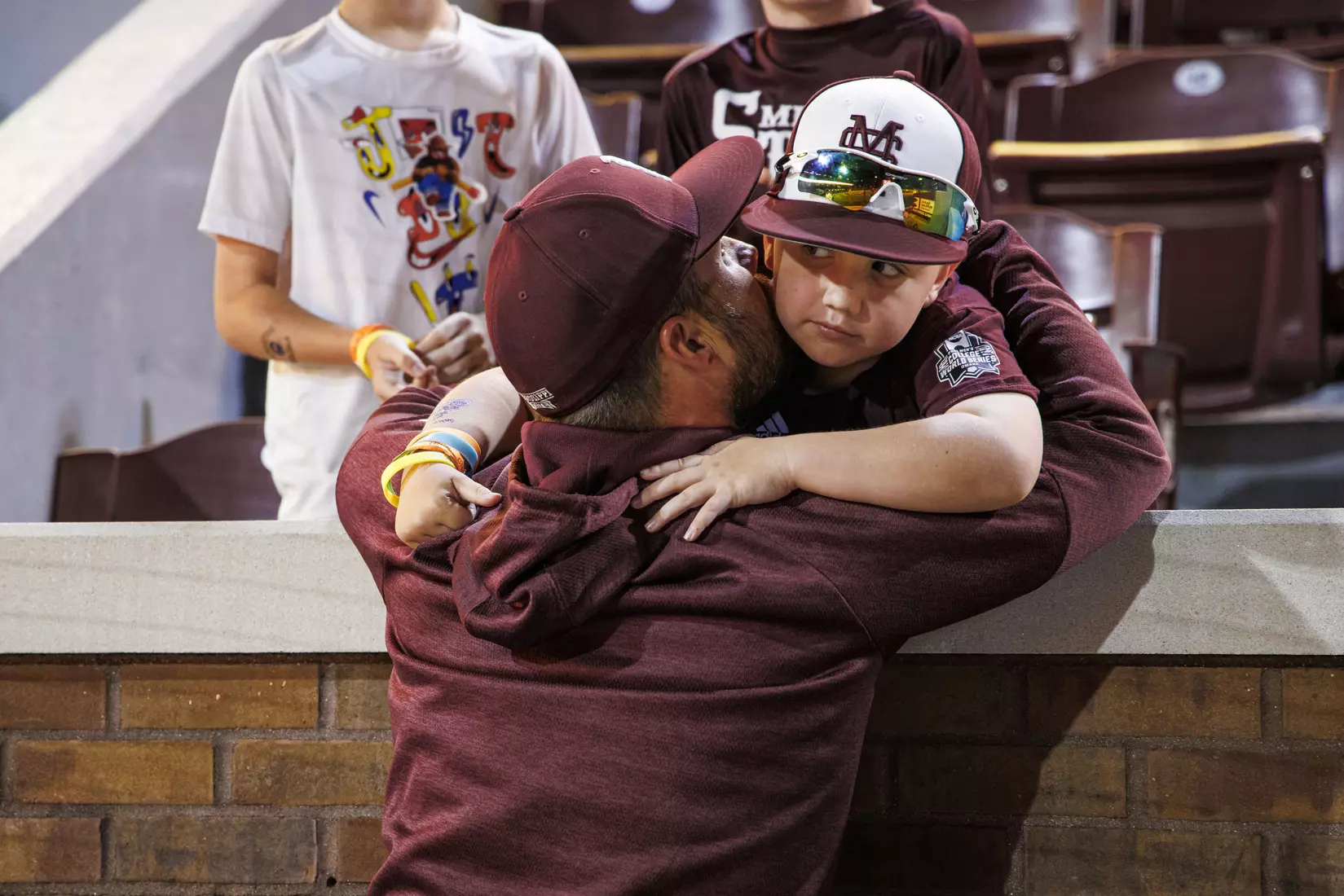 STARKVILLE, MS - April 19, 2022 - Mississippi State Assistant Coach Jake Gautreau and family during the game between the Jackson State Tigers and the Mississippi State Bulldogs at Dudy Noble Field at Polk-Dement Stadium in Starkville, MS. Photo By Sloane Bush