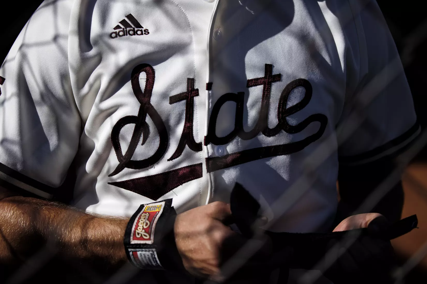 STARKVILLE, MS - April 26, 2022 - Script State word mark on a jersey before the game between the Mississippi State Bulldogs and the Ole Miss Rebels at Trustmark Park in Pearl, MS. Photo By Kevin Snyder