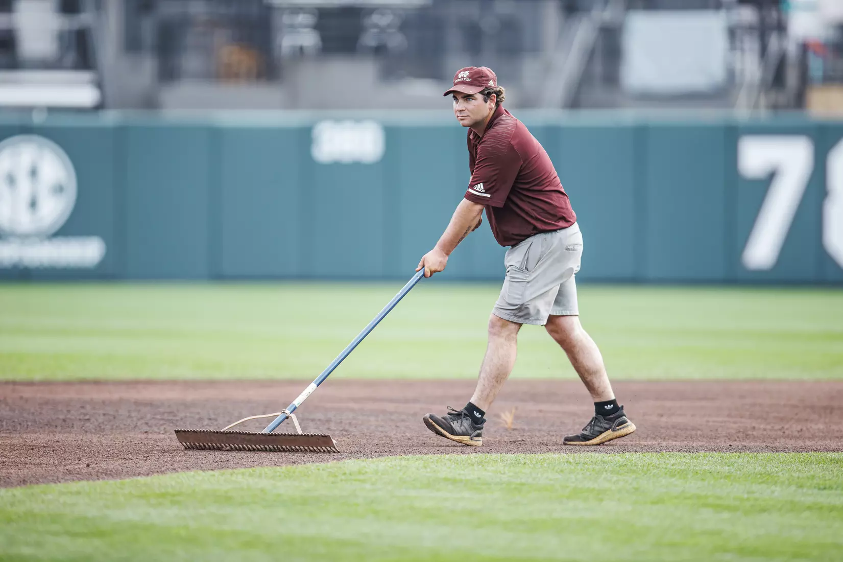 STARKVILLE, MS - February 22, 2022 - Mississippi State grounds crew preparing the field before the game between the University of Arkansas at Pine Bluff Golden Lions and the Mississippi State Bulldogs at Dudy Noble Field at Polk-Dement Stadium in Starkville, MS. Photo By Kevin Snyder