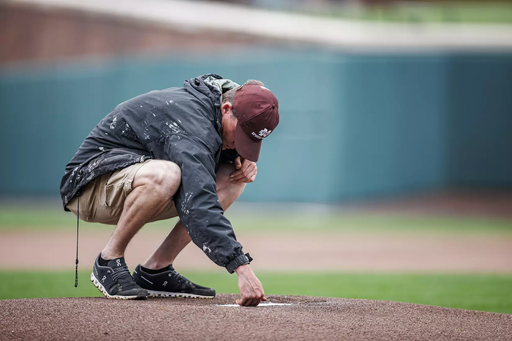 STARKVILLE, MS - February 22, 2022 - Mississippi State grounds crew prepares the pitcherÕs mound before the game between the University of Arkansas at Pine Bluff Golden Lions and the Mississippi State Bulldogs at Dudy Noble Field at Polk-Dement Stadium in Starkville, MS. Photo By Kevin Snyder