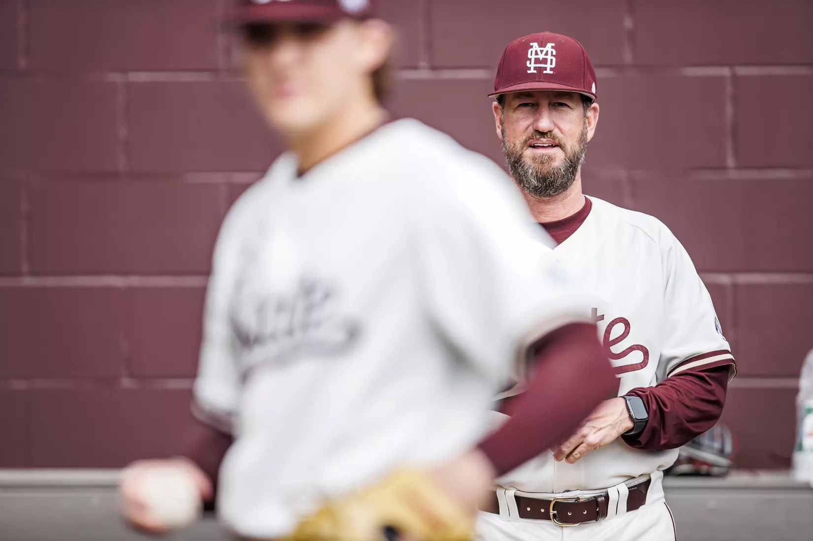 STARKVILLE, MS - February 22, 2022 - Mississippi State Assistant Coach Scott Foxhall in the bullpen before the game between the University of Arkansas at Pine Bluff Golden Lions and the Mississippi State Bulldogs at Dudy Noble Field at Polk-Dement Stadium in Starkville, MS. Photo By Kevin Snyder
