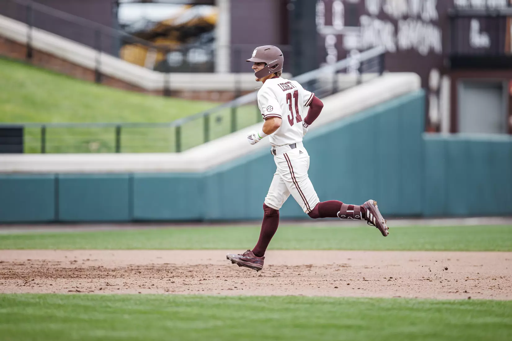 STARKVILLE, MS - February 22, 2022 - Mississippi State Infielder Tanner Leggett (#31) runs the bases after hitting a home run during the game between the University of Arkansas at Pine Bluff Golden Lions and the Mississippi State Bulldogs at Dudy Noble Field at Polk-Dement Stadium in Starkville, MS. Photo By Kevin Snyder