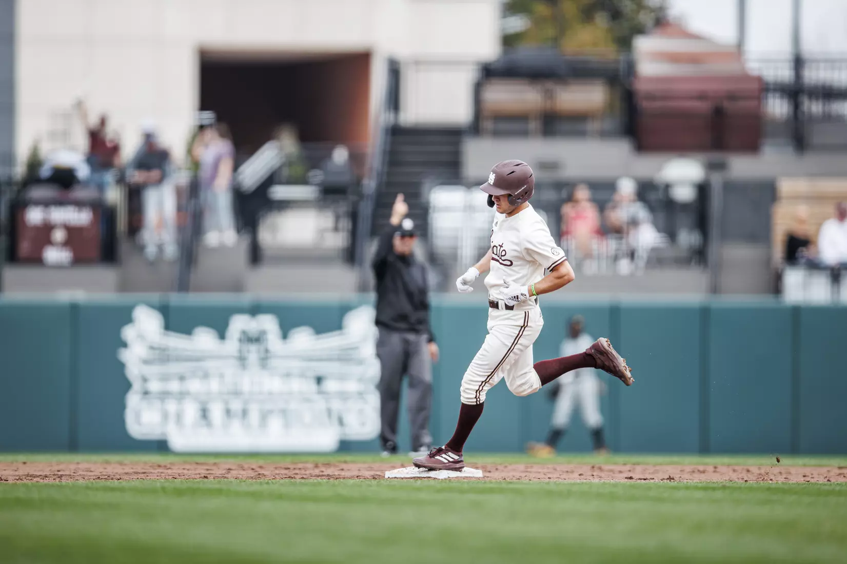 STARKVILLE, MS - February 22, 2022 - Mississippi State Infielder Davis Meche (#12) rounds the bases after hitting a home run during the game between the University of Arkansas at Pine Bluff Golden Lions and the Mississippi State Bulldogs at Dudy Noble Field at Polk-Dement Stadium in Starkville, MS. Photo By Kevin Snyder