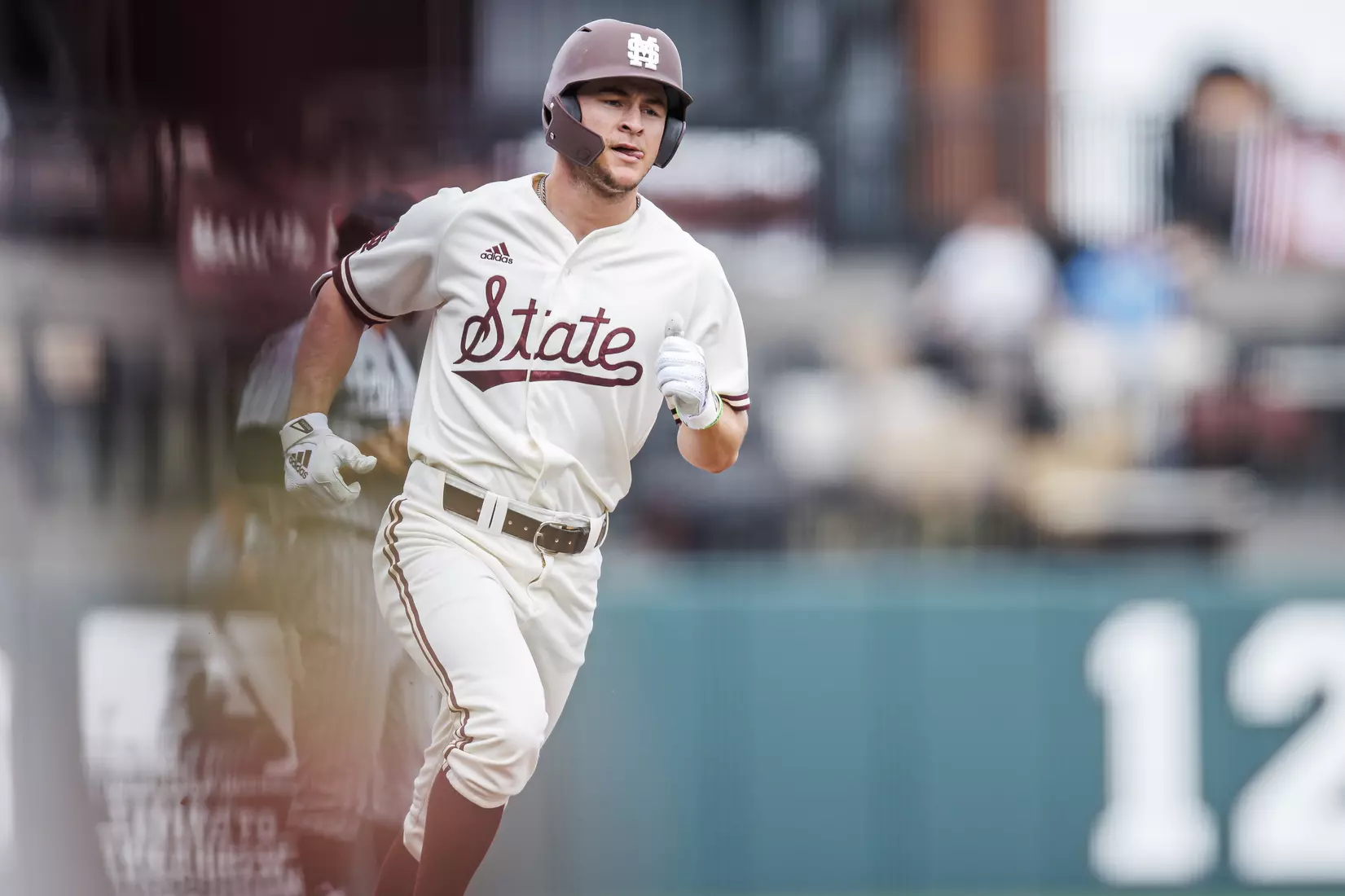 STARKVILLE, MS - February 22, 2022 - Mississippi State Infielder Davis Meche (#12) rounds the bases after hitting a home run during the game between the University of Arkansas at Pine Bluff Golden Lions and the Mississippi State Bulldogs at Dudy Noble Field at Polk-Dement Stadium in Starkville, MS. Photo By Kevin Snyder