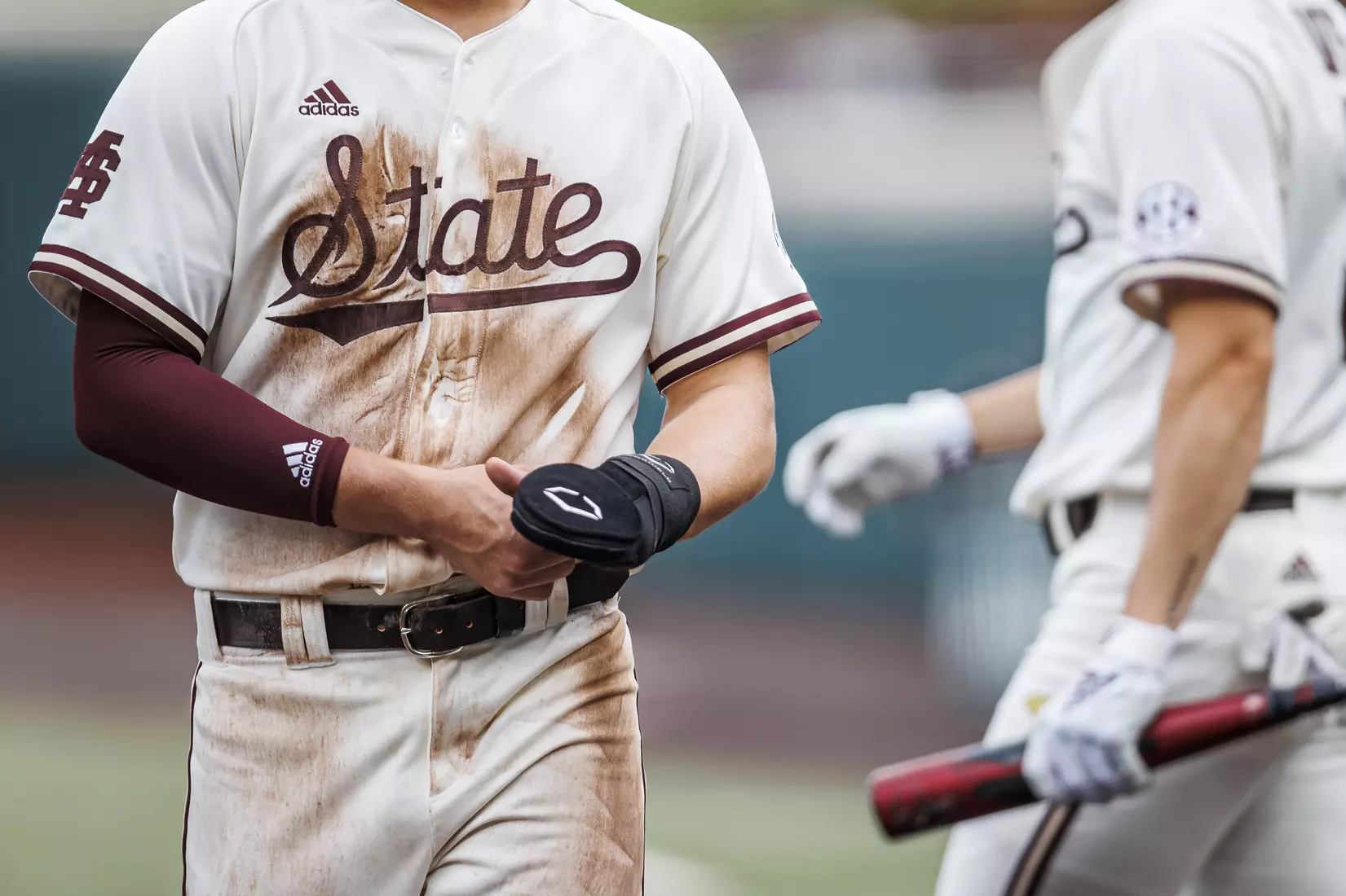 STARKVILLE, MS - February 22, 2022 - Dirt stains over the Script State word mark on the jersey during the game between the University of Arkansas at Pine Bluff Golden Lions and the Mississippi State Bulldogs at Dudy Noble Field at Polk-Dement Stadium in Starkville, MS. Photo By Kevin Snyder